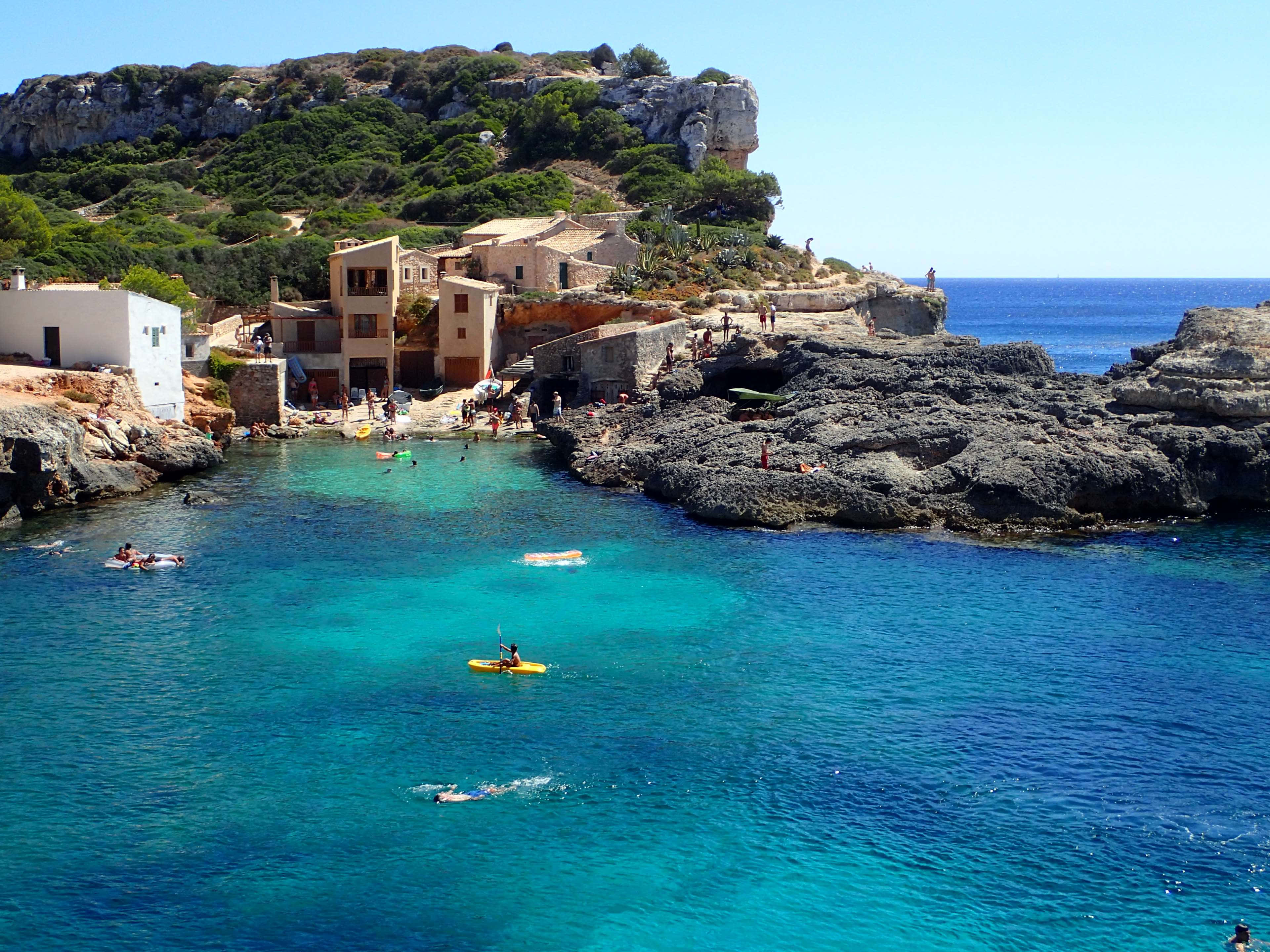 Idyllic Beach, turquoise waters, rocky coves, 4K Desktop Wallpaper