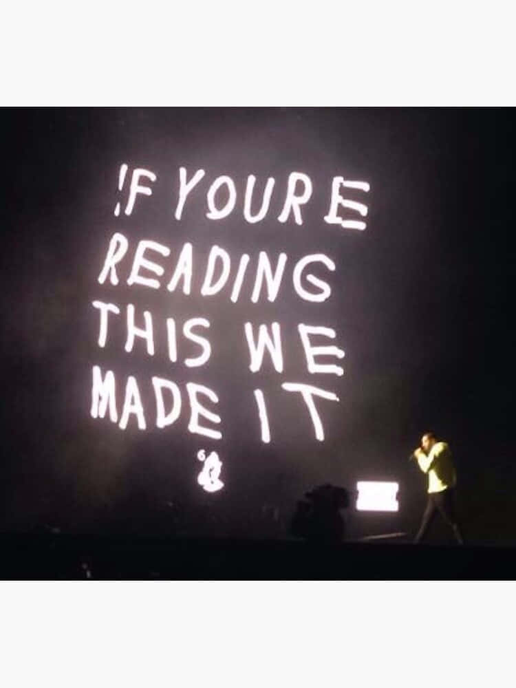 IF YOU'RE READING THIS WE MADE IT, bright yellow jacket, dark stage, SD Phone Wallpaper