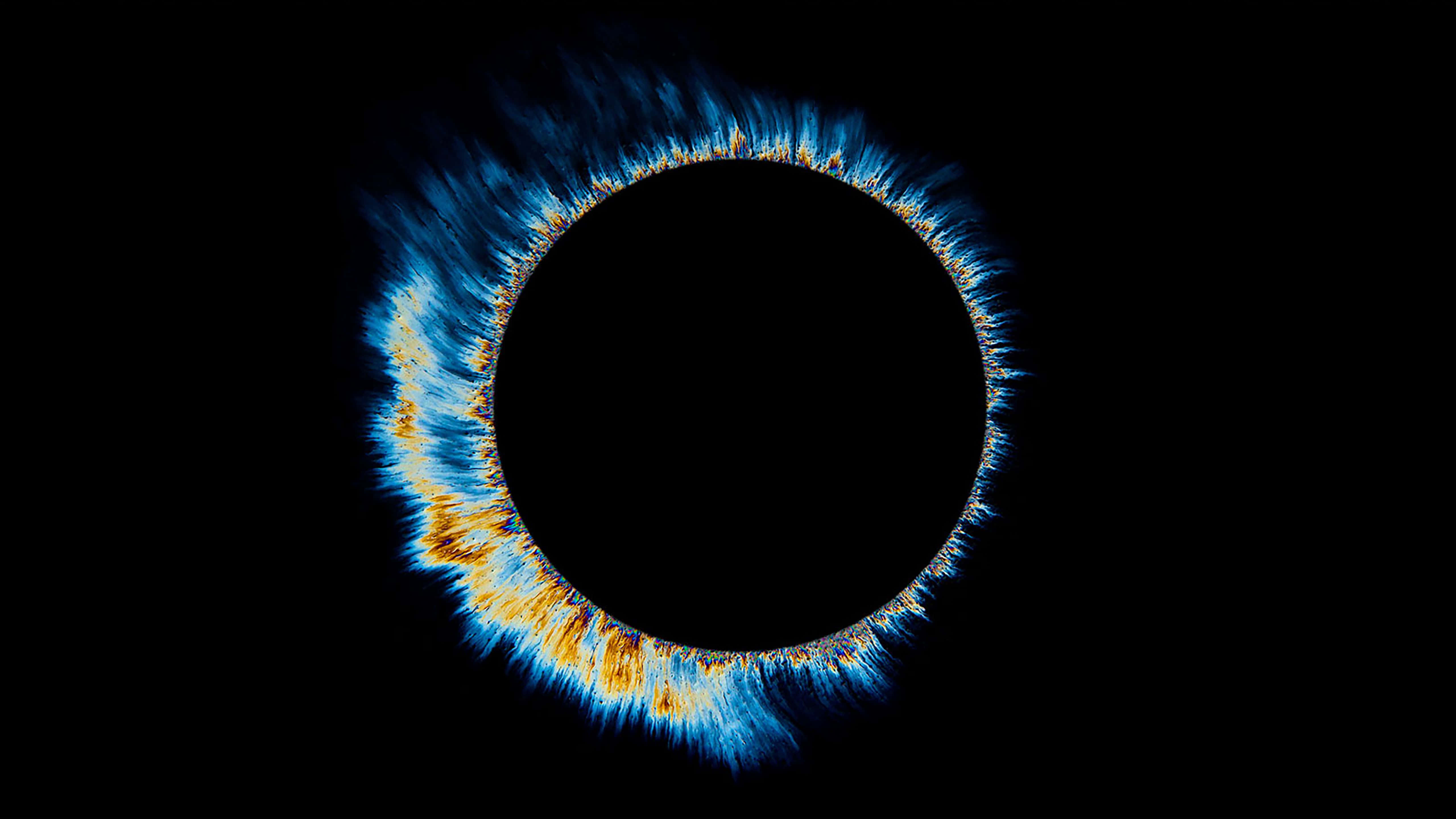 iMac Pro, minimalist white desk, glowing blue and orange ring of fire, 5K Desktop Wallpaper