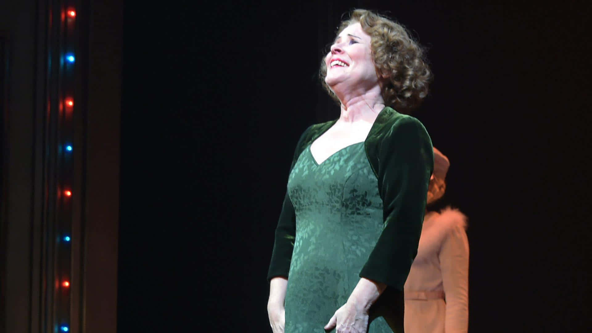 Imelda Staunton, green velvet dress, dimly lit stage, Full HD Desktop Wallpaper