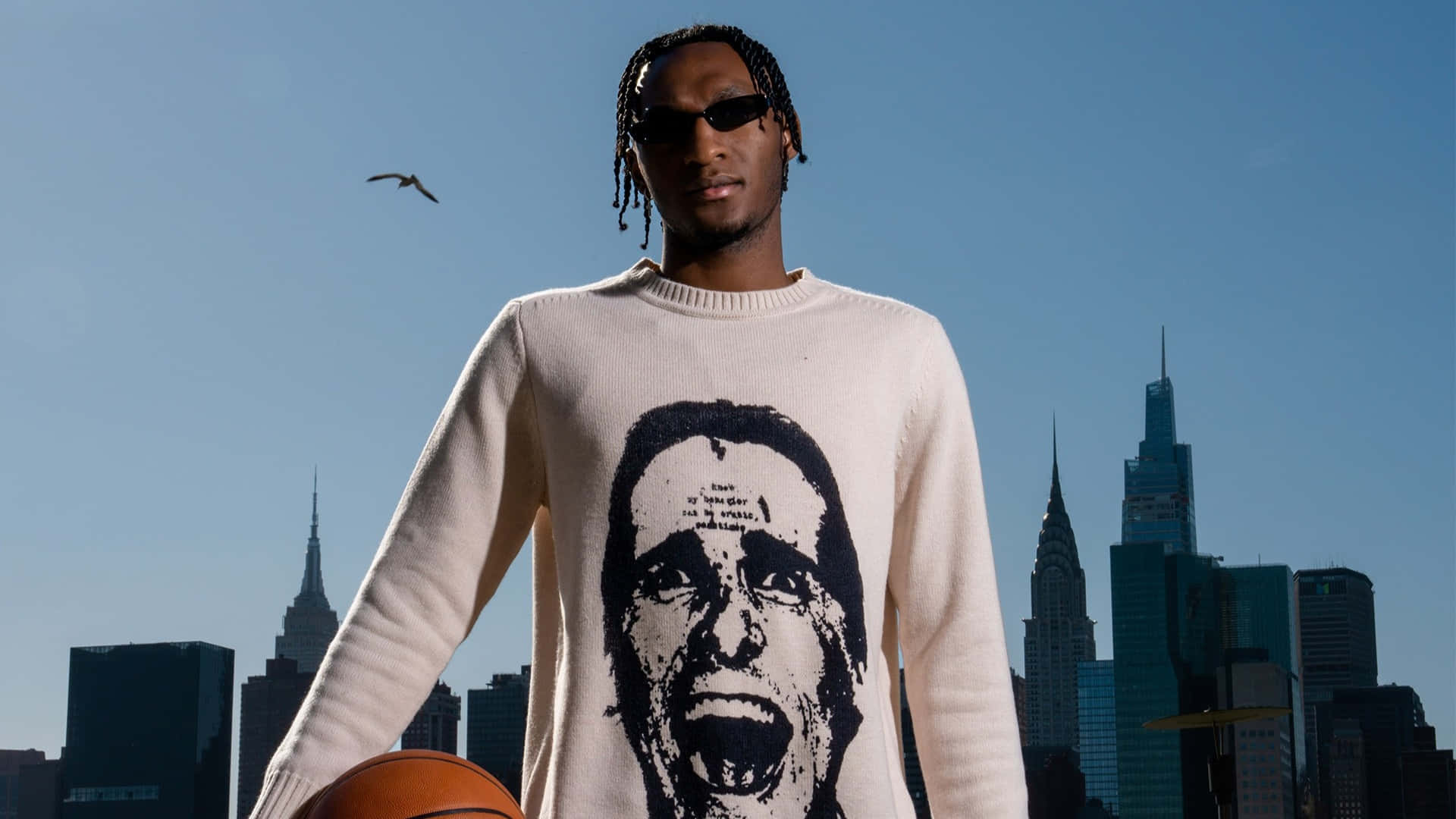 Immanuel Quickley, cream sweater, black graphic of a shouting face, Full HD Desktop Wallpaper