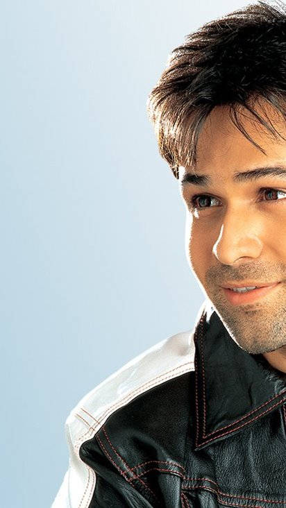 Imran Hashmi, black and white leather jacket, soft blue background, SD Phone Wallpaper