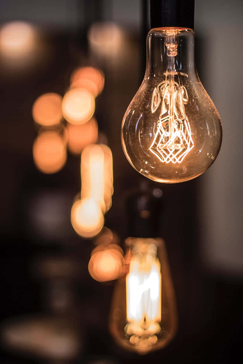 incandescent bulb, abstract filament, warm bokeh lights, SD Phone Wallpaper