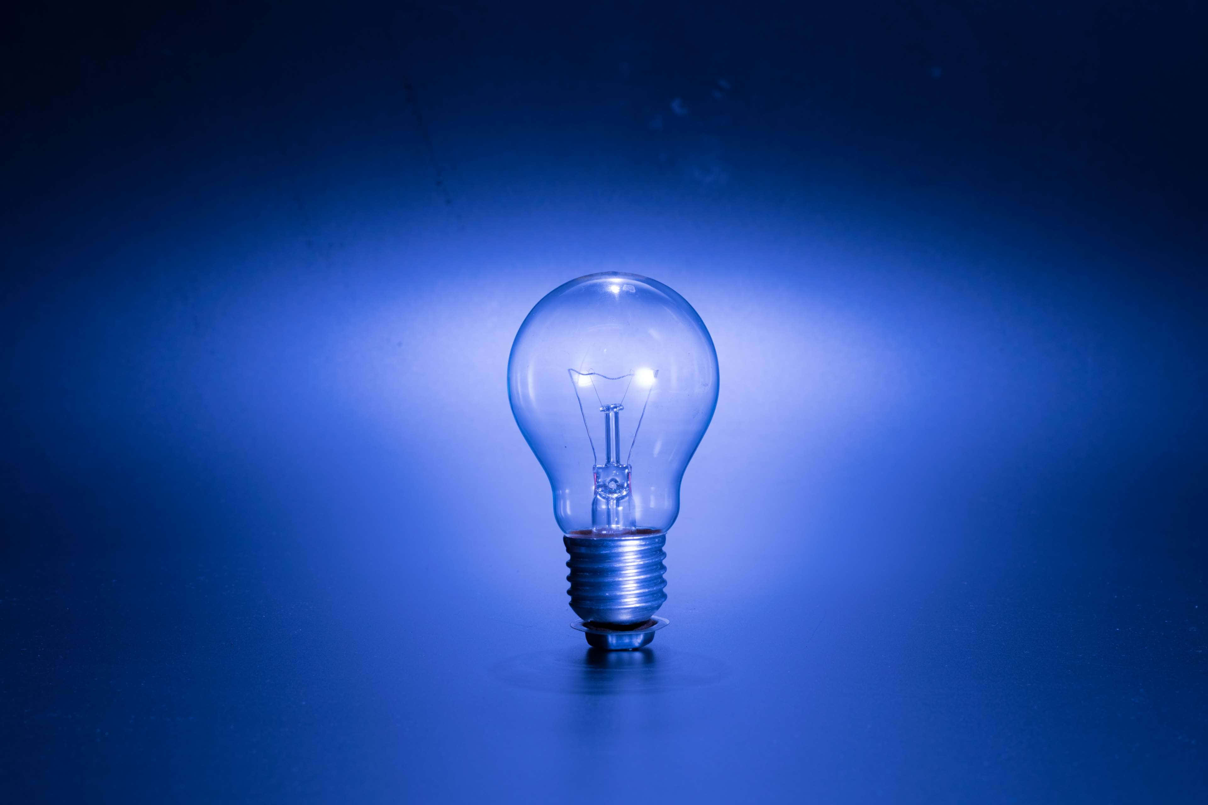 blue incandescent bulb, glowing incandescent light bulb, soft blue radiance, 4K Desktop Wallpaper