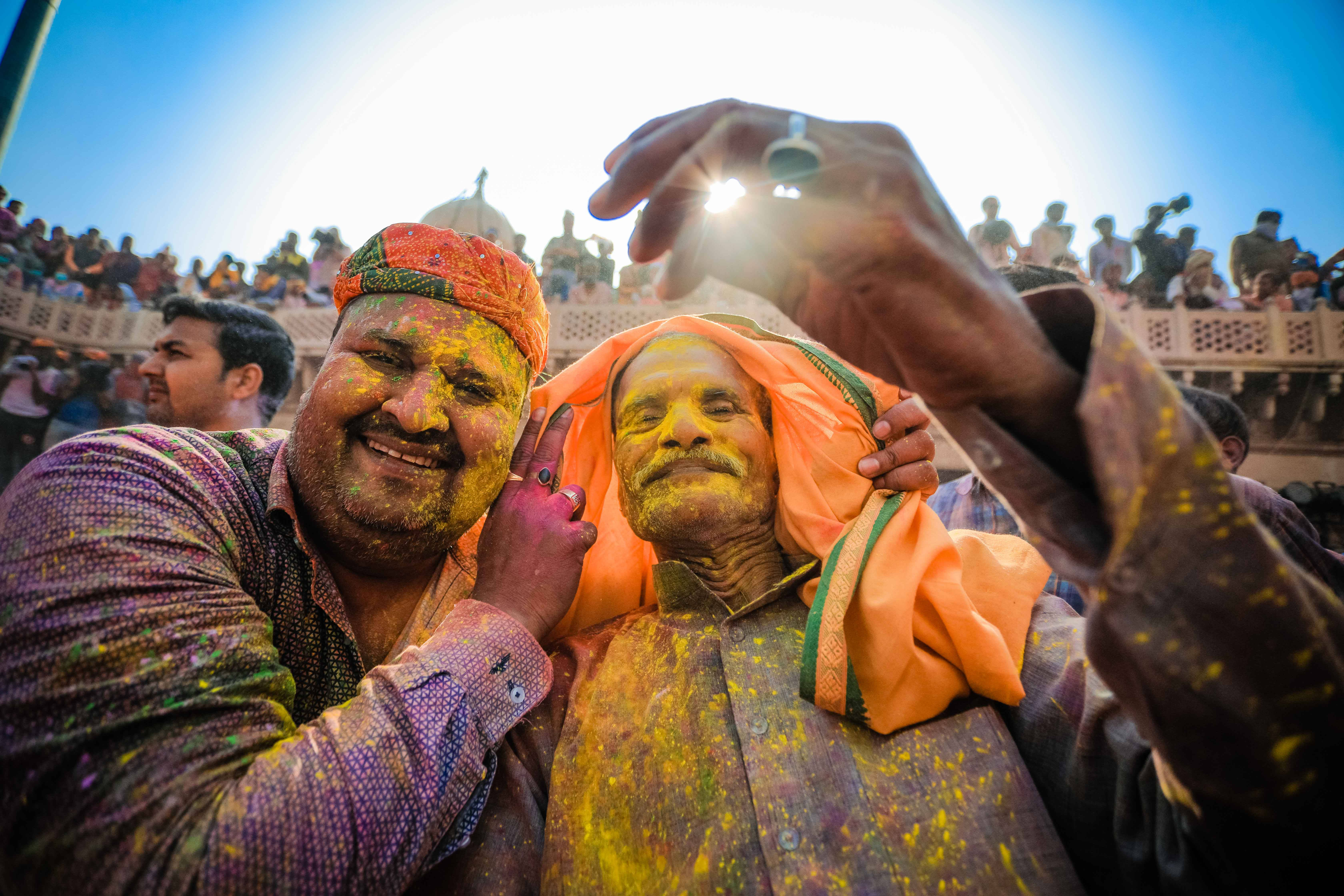 India Holi, yellow powder, glowing sun, 5K Desktop Wallpaper