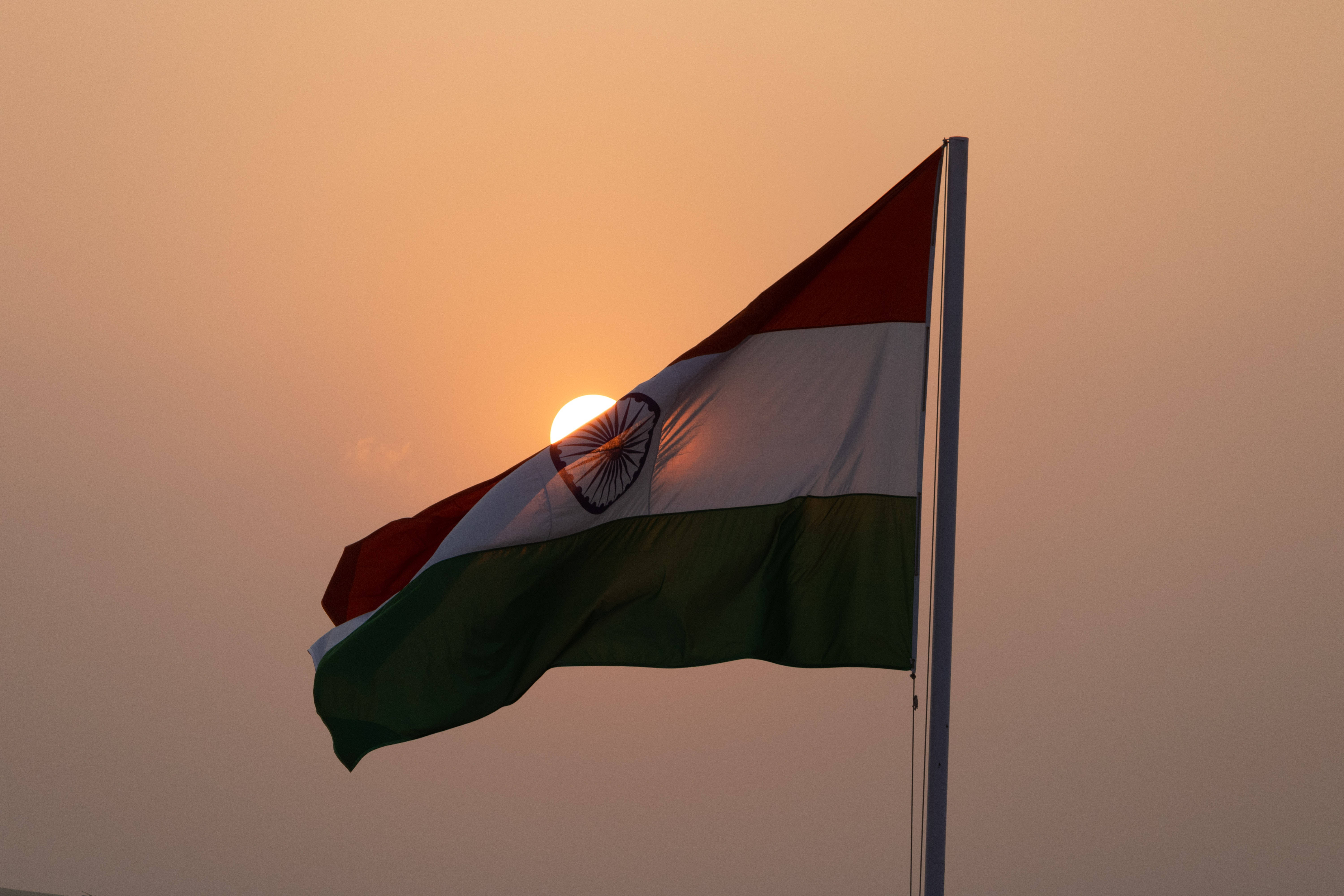 Indian flag, warm sunset sky, sun glowing, 5K Desktop Wallpaper