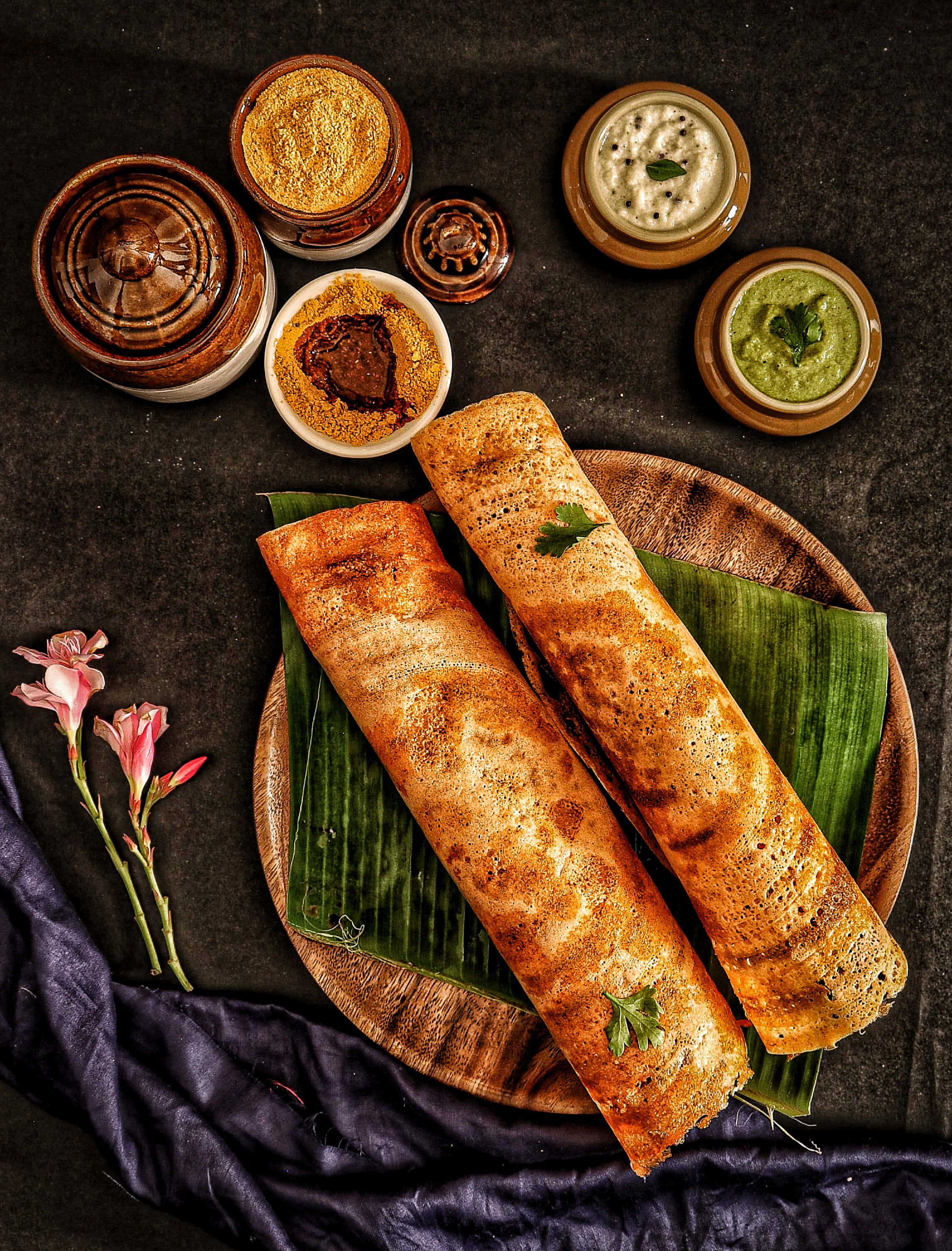 crispy masala dosa, golden-brown rolled dosas, banana leaves, 2K Phone Wallpaper