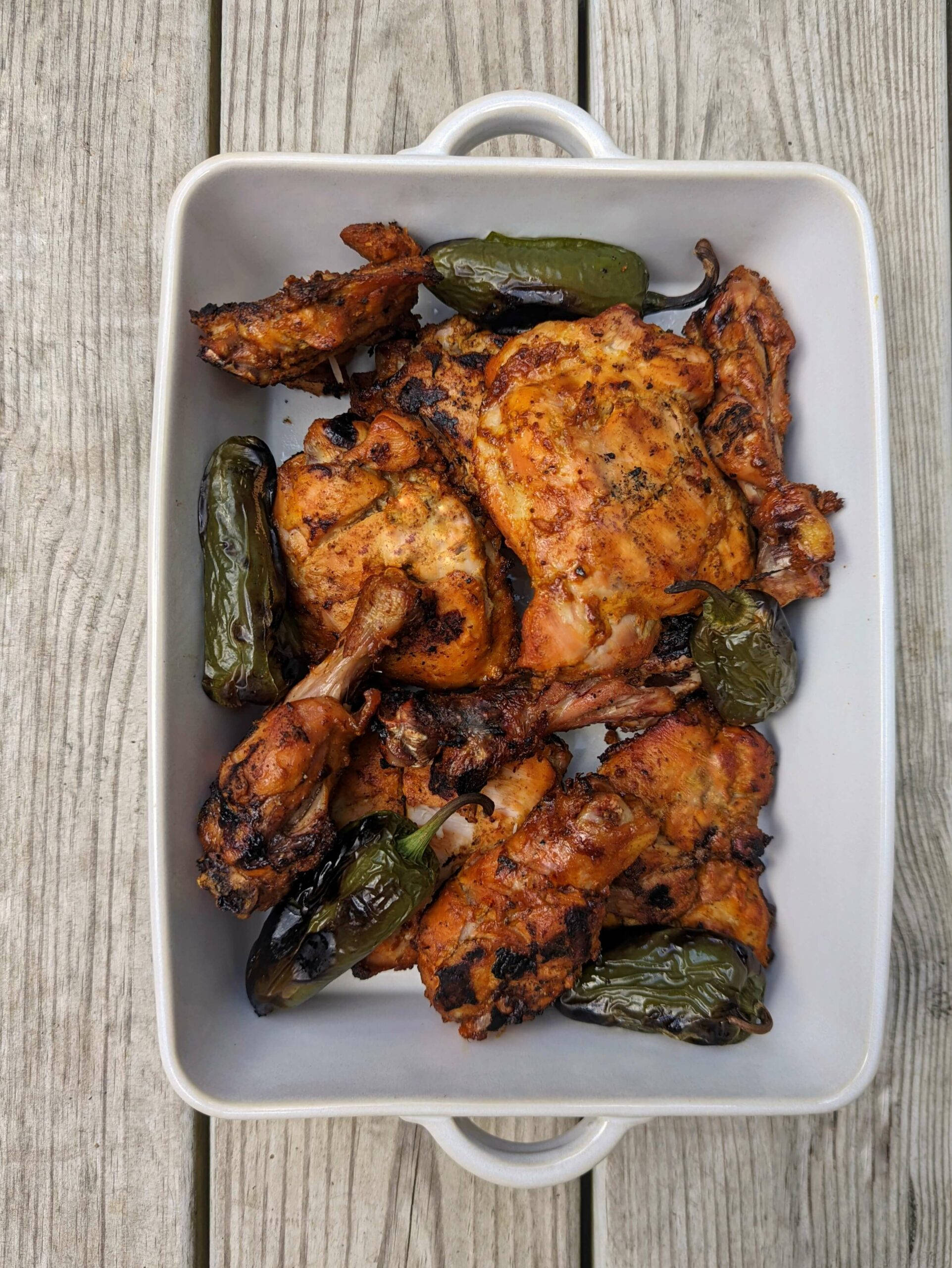 tandoori chicken, white ceramic dish, charred green chilies, 2K Phone Wallpaper