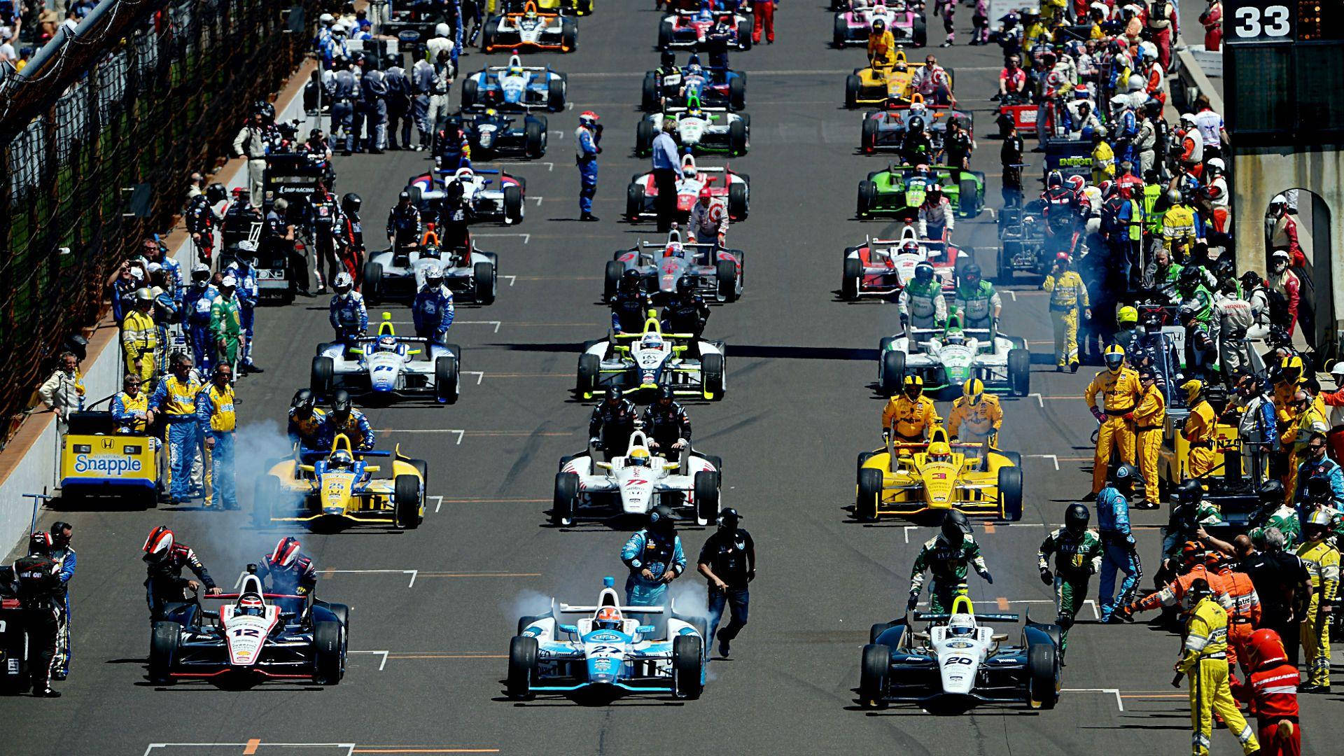Indianapolis 500, open-wheel race cars, sunlit track, Full HD Desktop Wallpaper