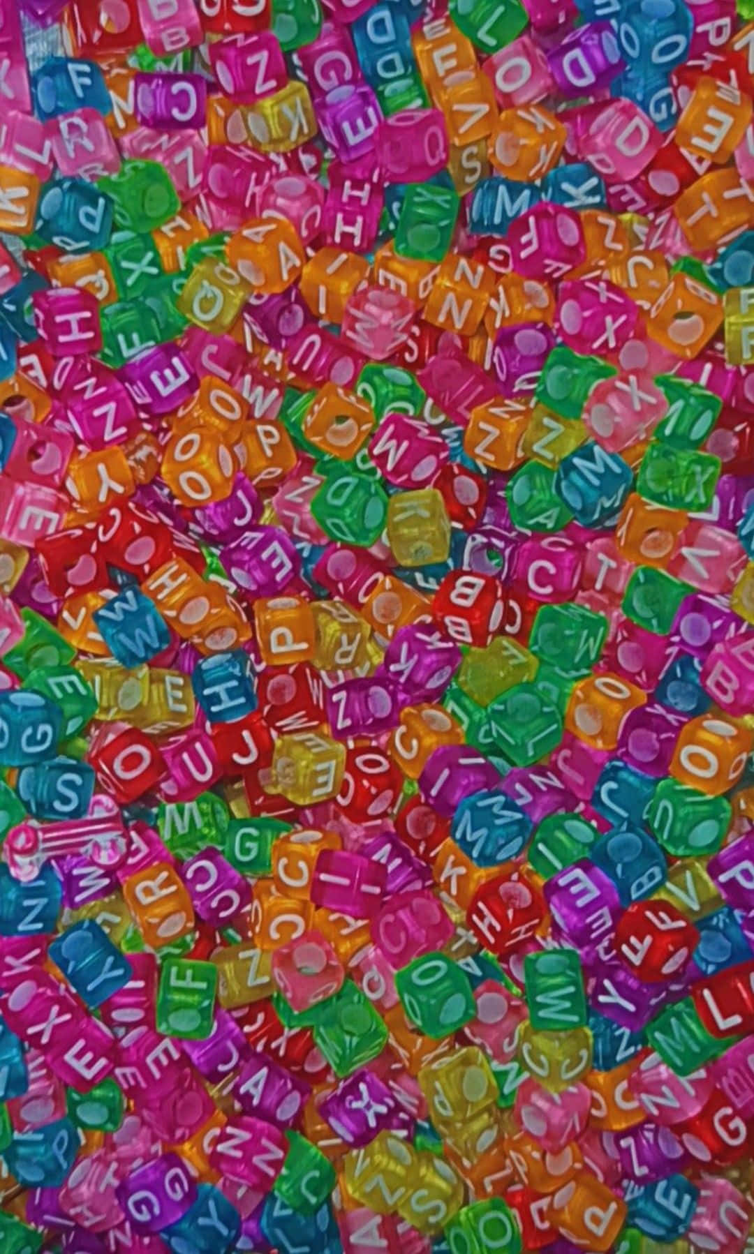 Indie iPhone, colorful translucent letter dice, close-up, HD Phone Wallpaper