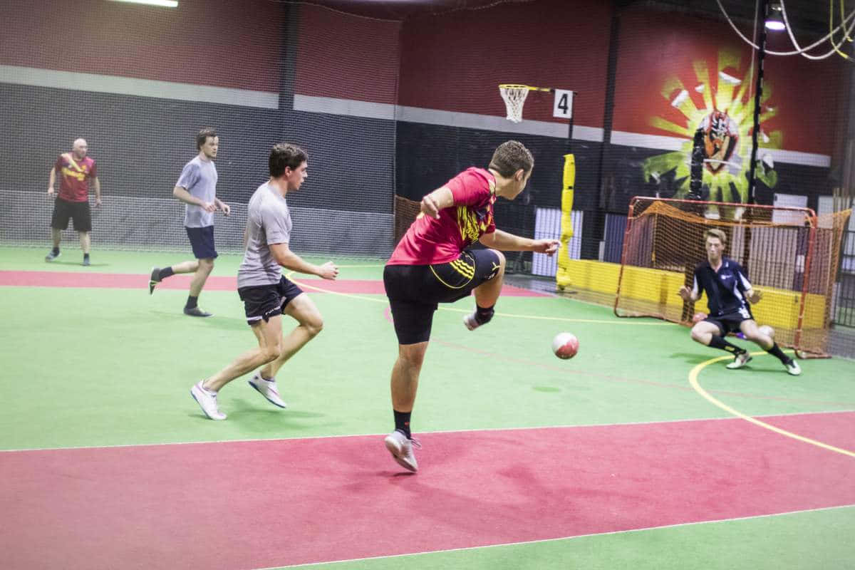 indoor soccer, red shirt, green and red court, SD Desktop Wallpaper