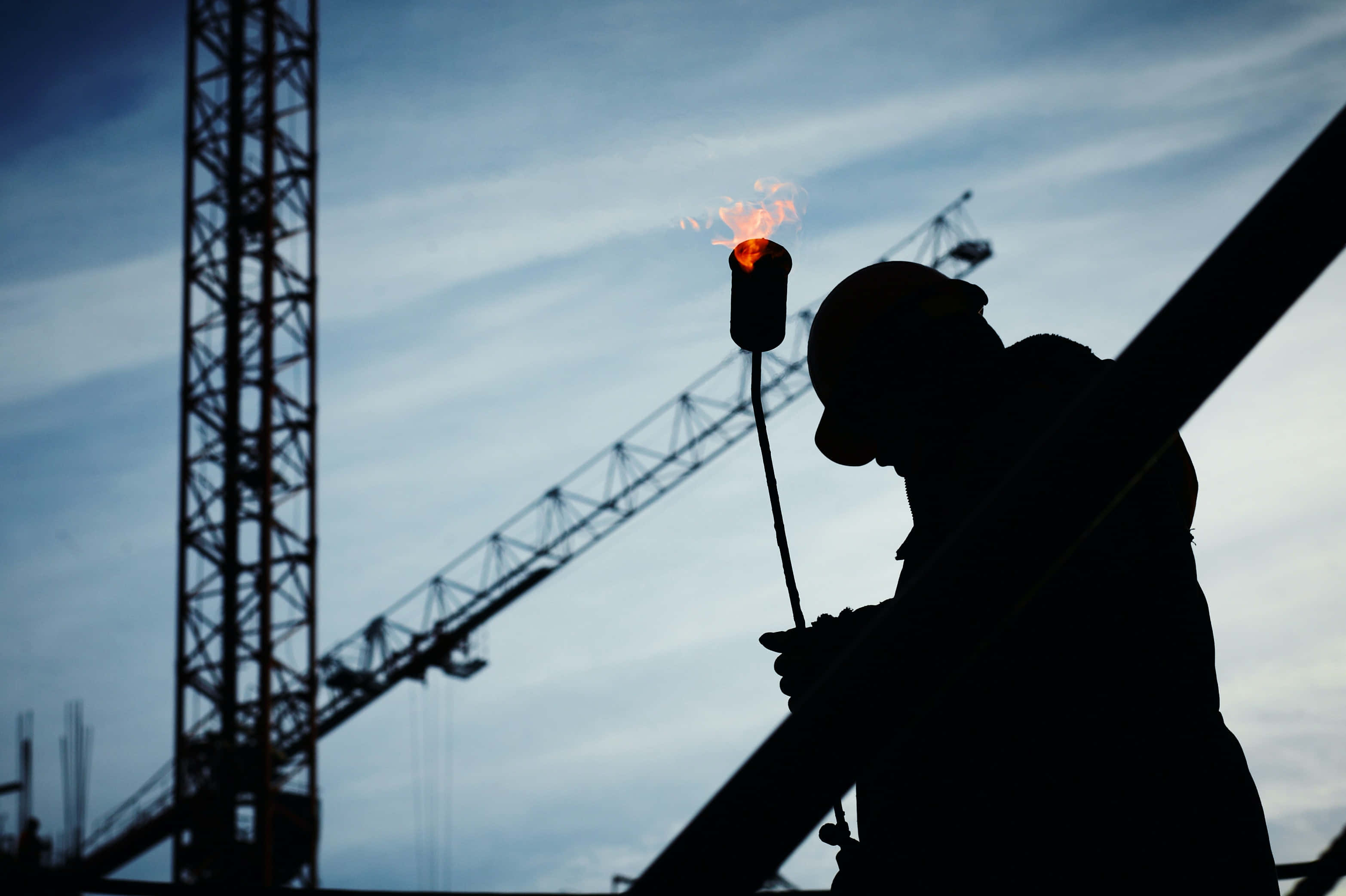 welder, bright torch, twilight sky, 2K Desktop Wallpaper