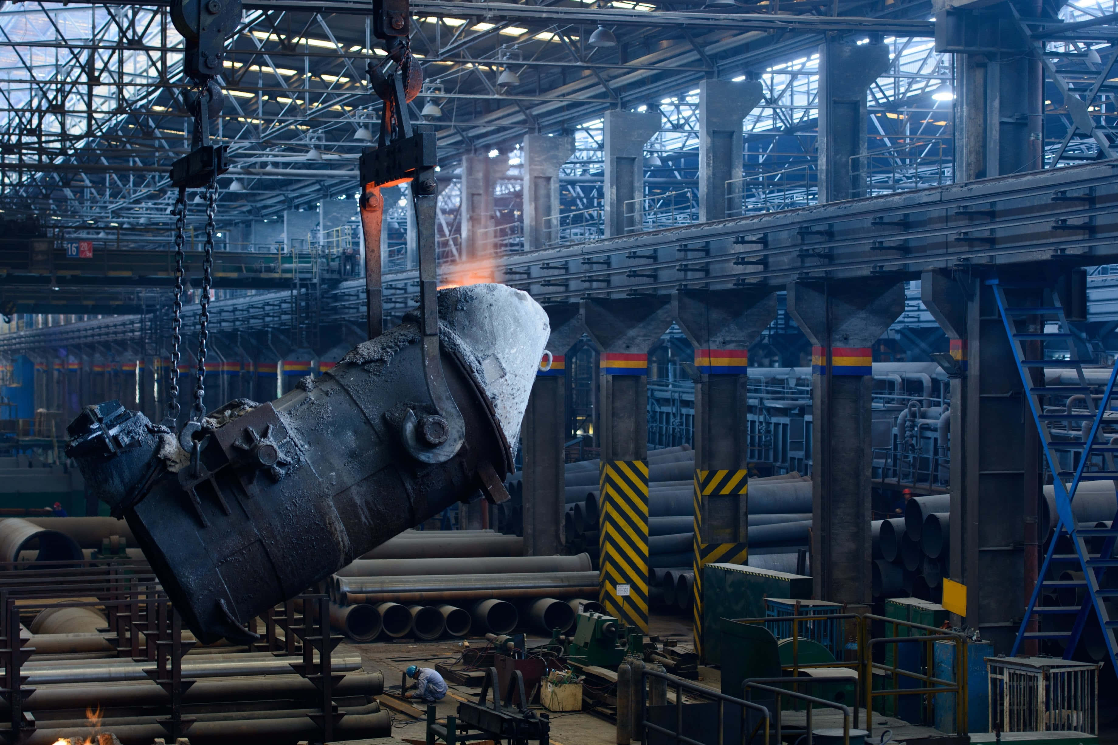 industrial steel mill, glowing molten metal ingot, crane, 2K Desktop Wallpaper
