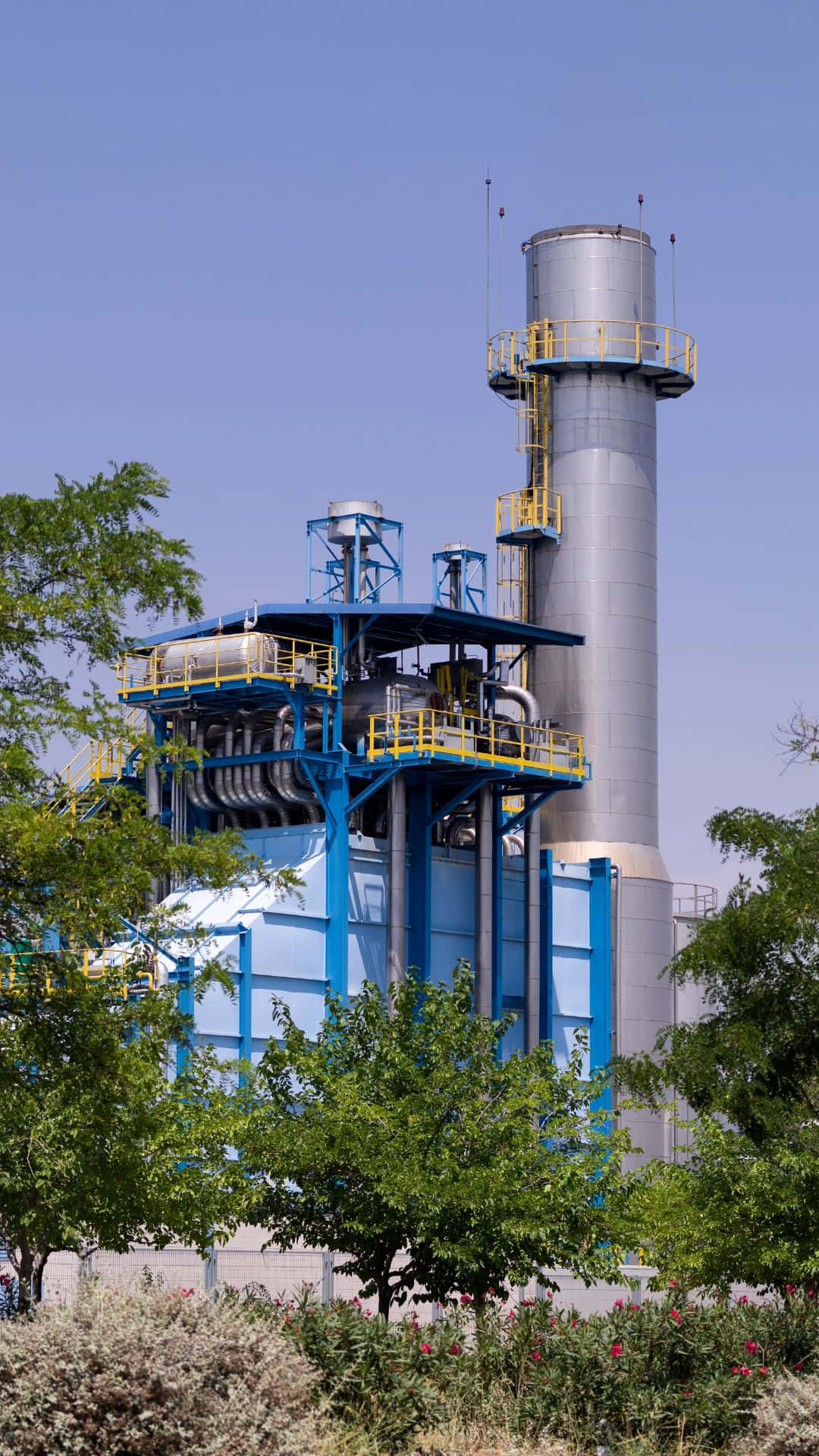 blue and silver industrial plant, yellow safety railings, clear blue sky, Full HD Phone Wallpaper