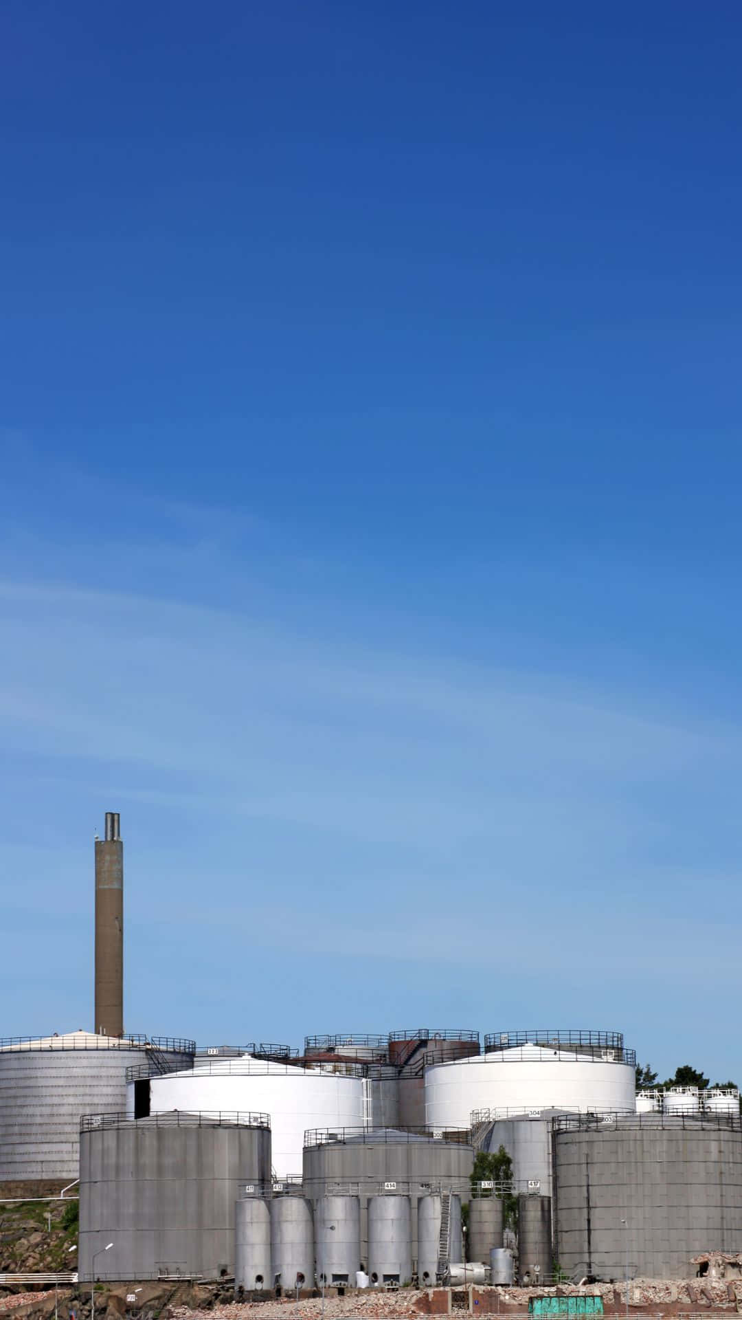 industrial storage tanks, tall chimney, vast clear blue sky, Full HD Phone Wallpaper