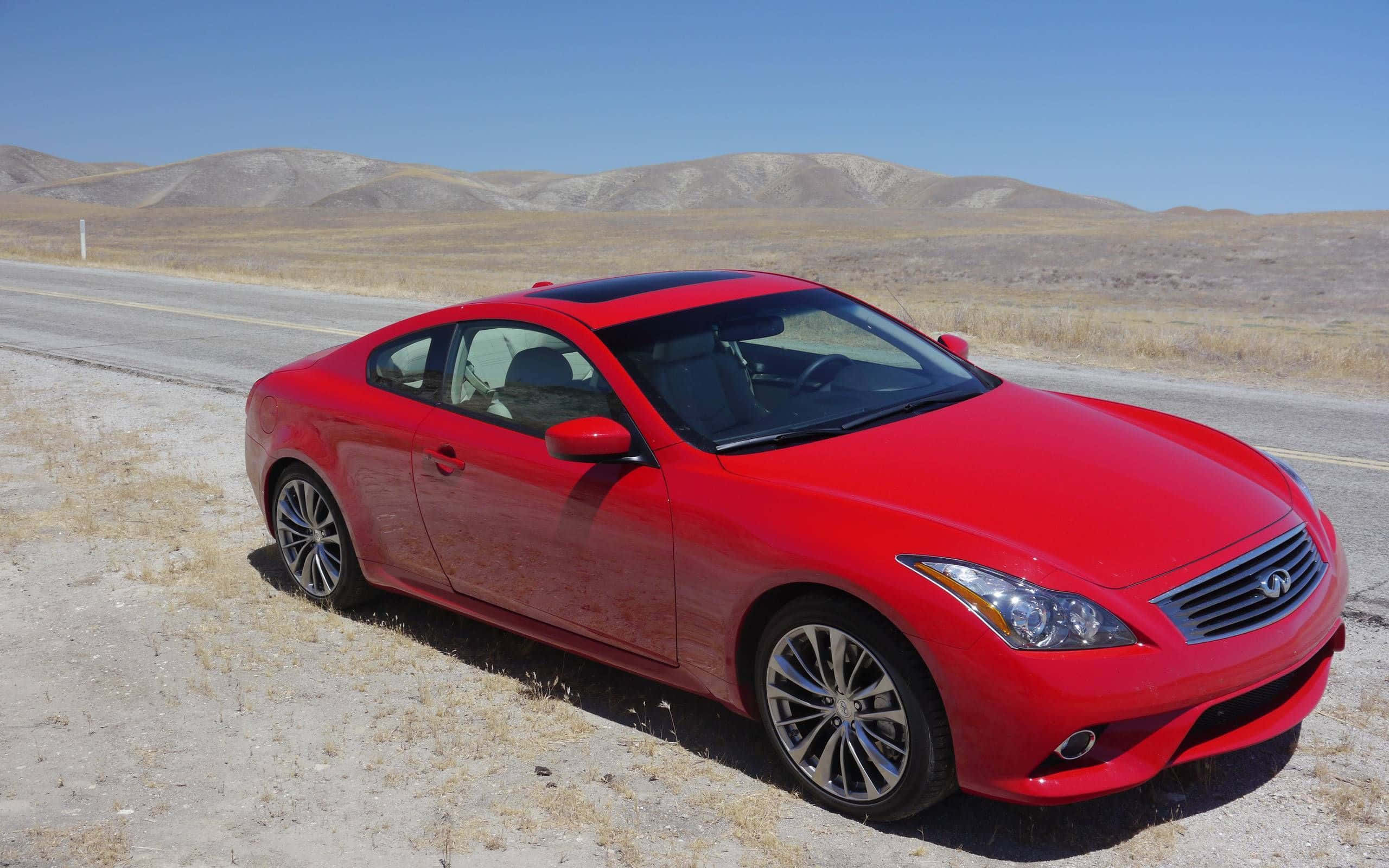 Infiniti G37, vibrant red, dusty roadside, 2K Desktop Wallpaper