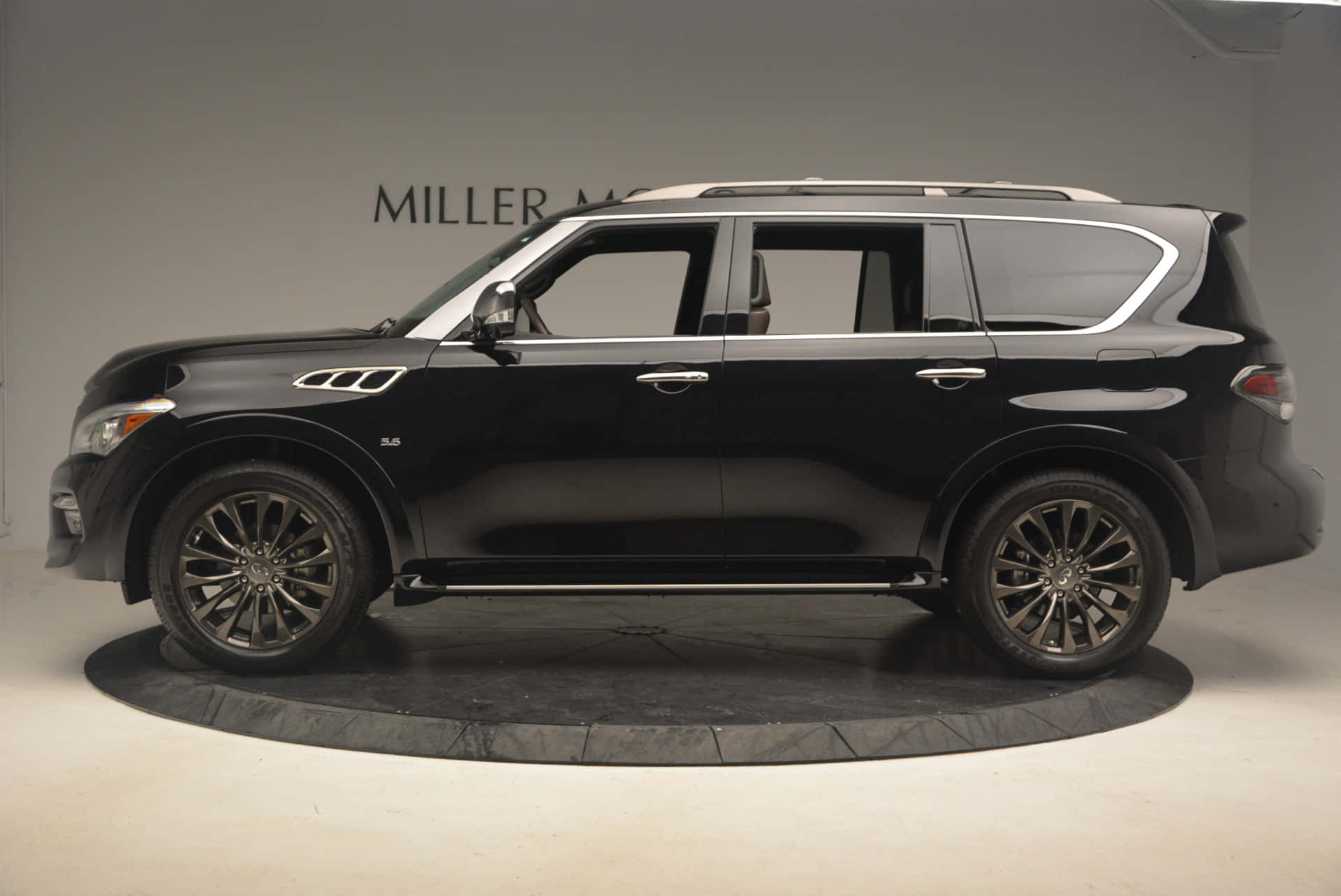 Infiniti QX80, sleek black, studio setting, Full HD Desktop Wallpaper
