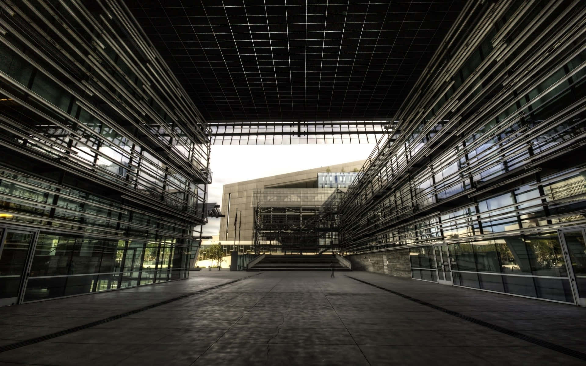 modern glass and steel building complex, lone figure, bright sky, Full HD Desktop Wallpaper