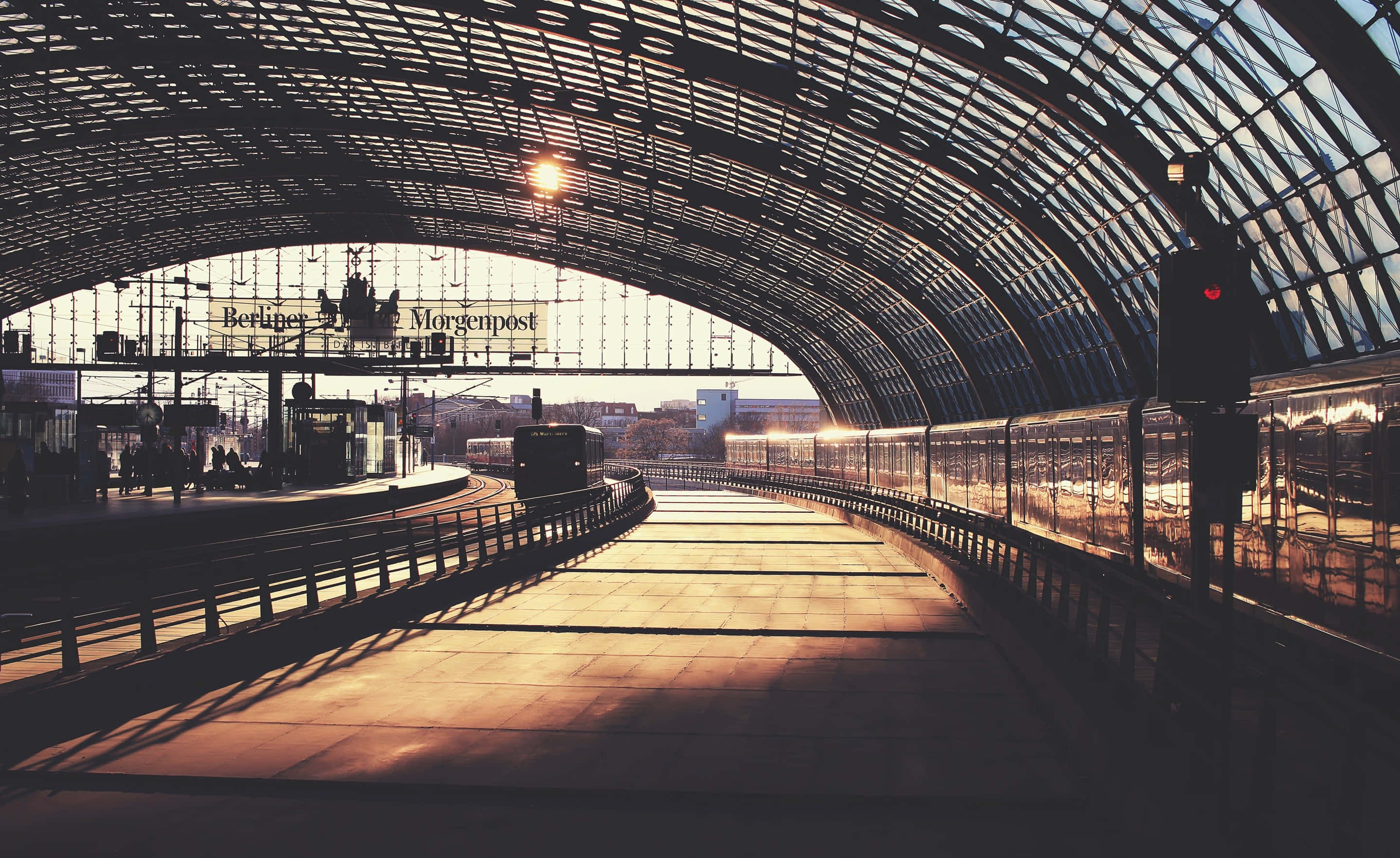 Sunlight, glass arched roof, empty train station platform, 2K Desktop Wallpaper