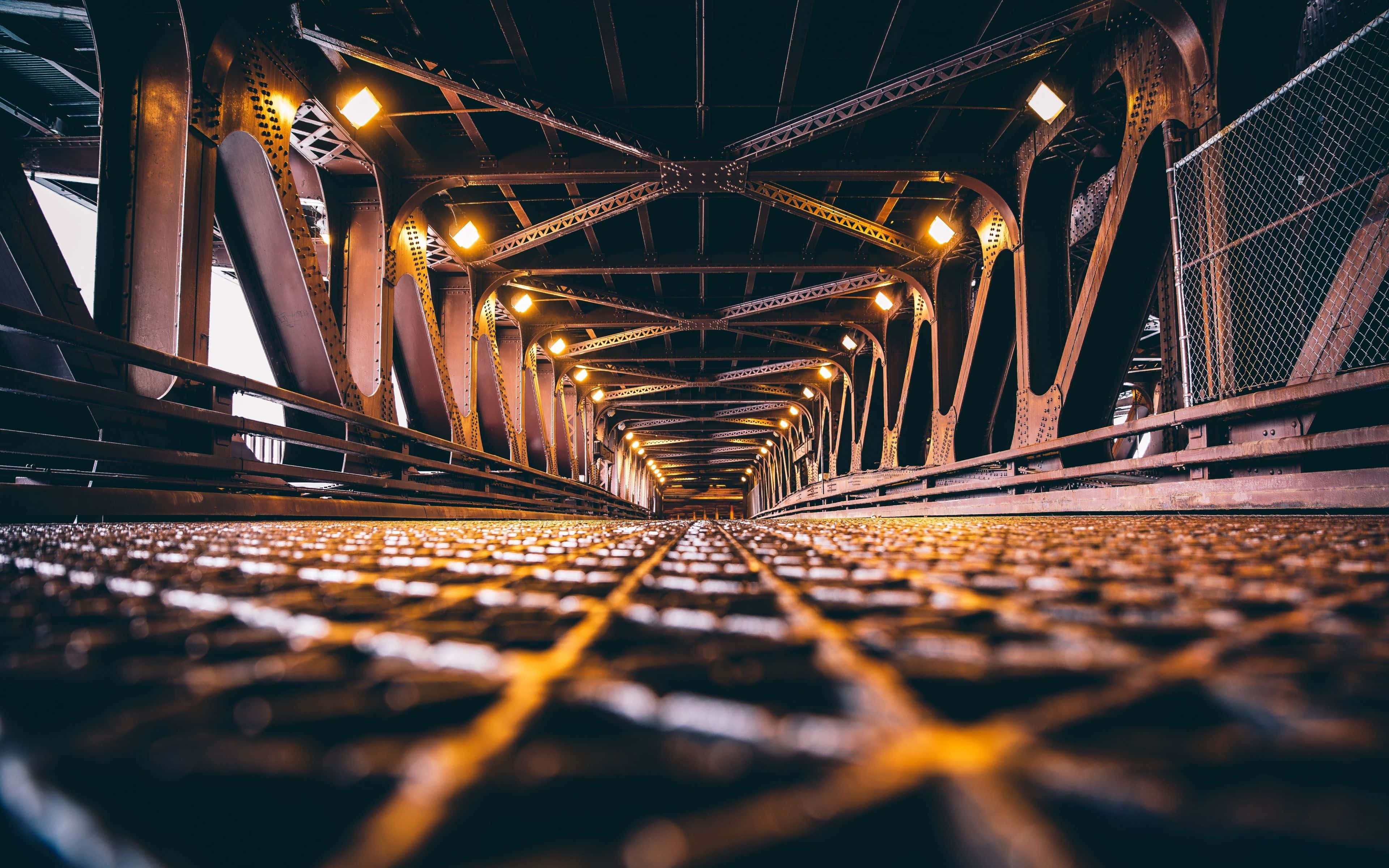 steel truss bridge, night, warm glowing lights, 4K Desktop Wallpaper