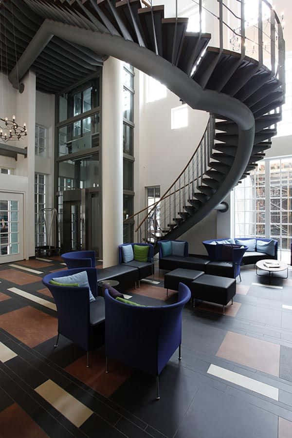 Inntel Hotel Zaandam, sweeping spiral staircase, dark metal steps, SD Phone Wallpaper