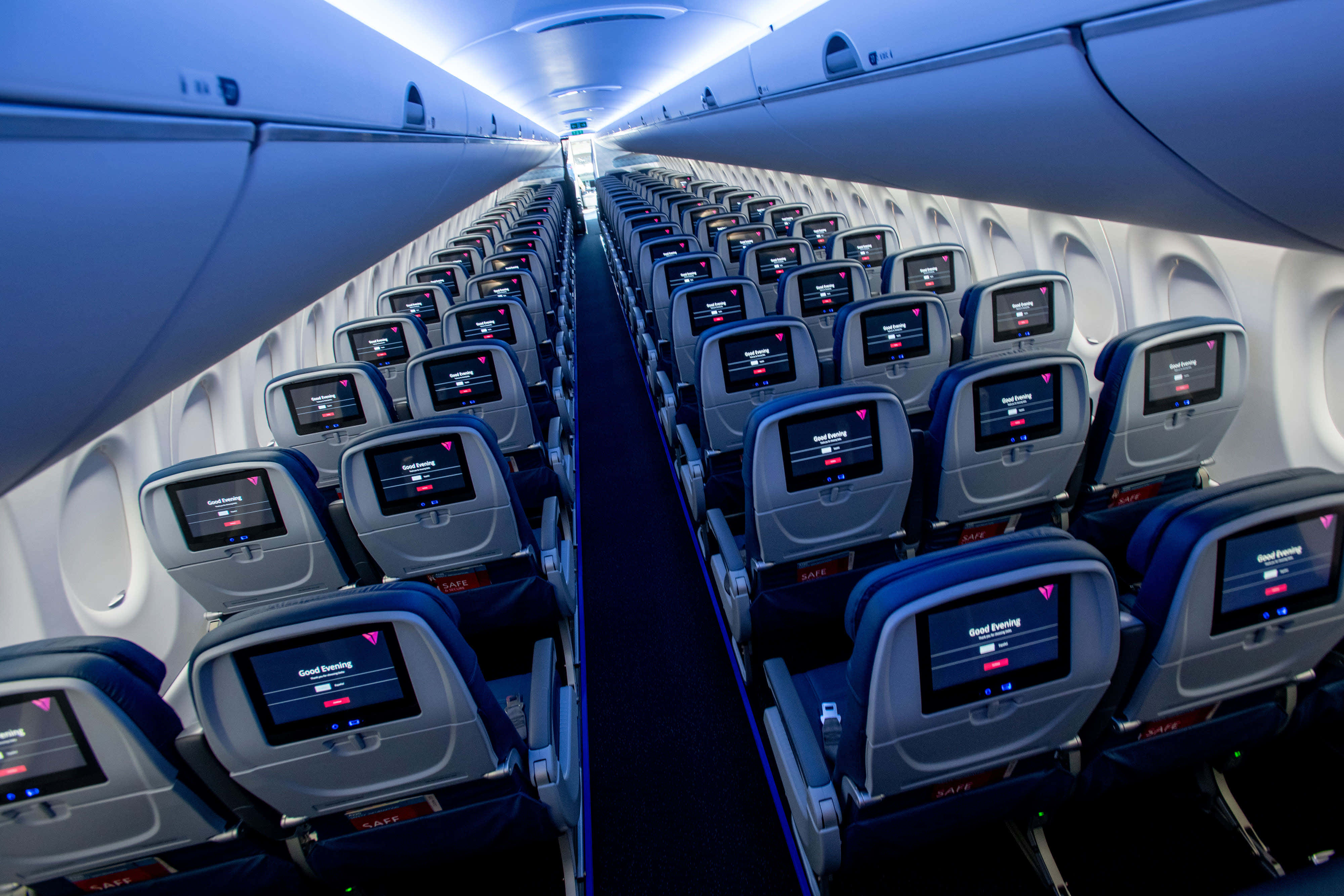 empty economy class seat, airplane cabin, rows of airplane seats, 4K Desktop Wallpaper