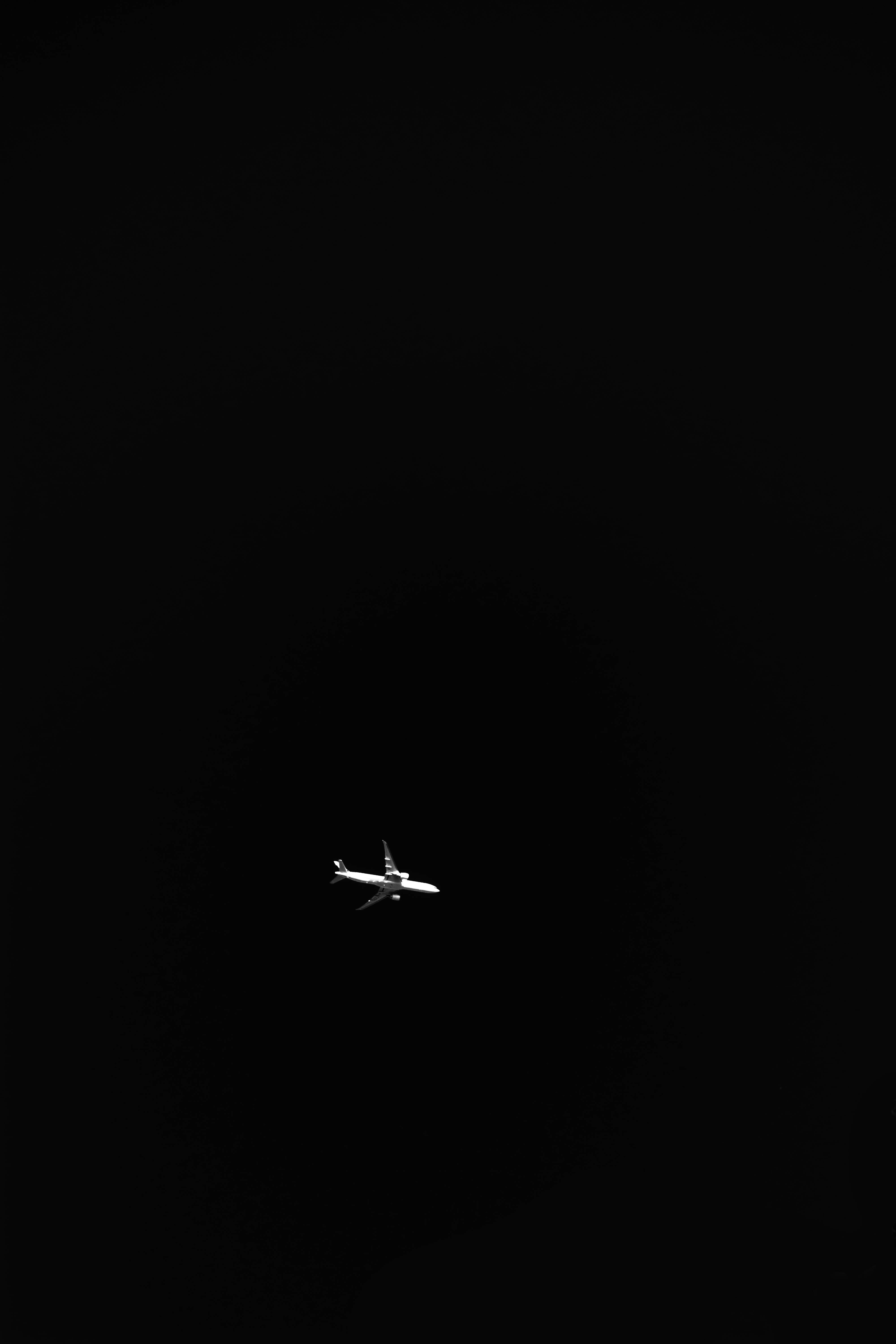 black background, white airplane, pitch-black sky, 5K Phone Wallpaper
