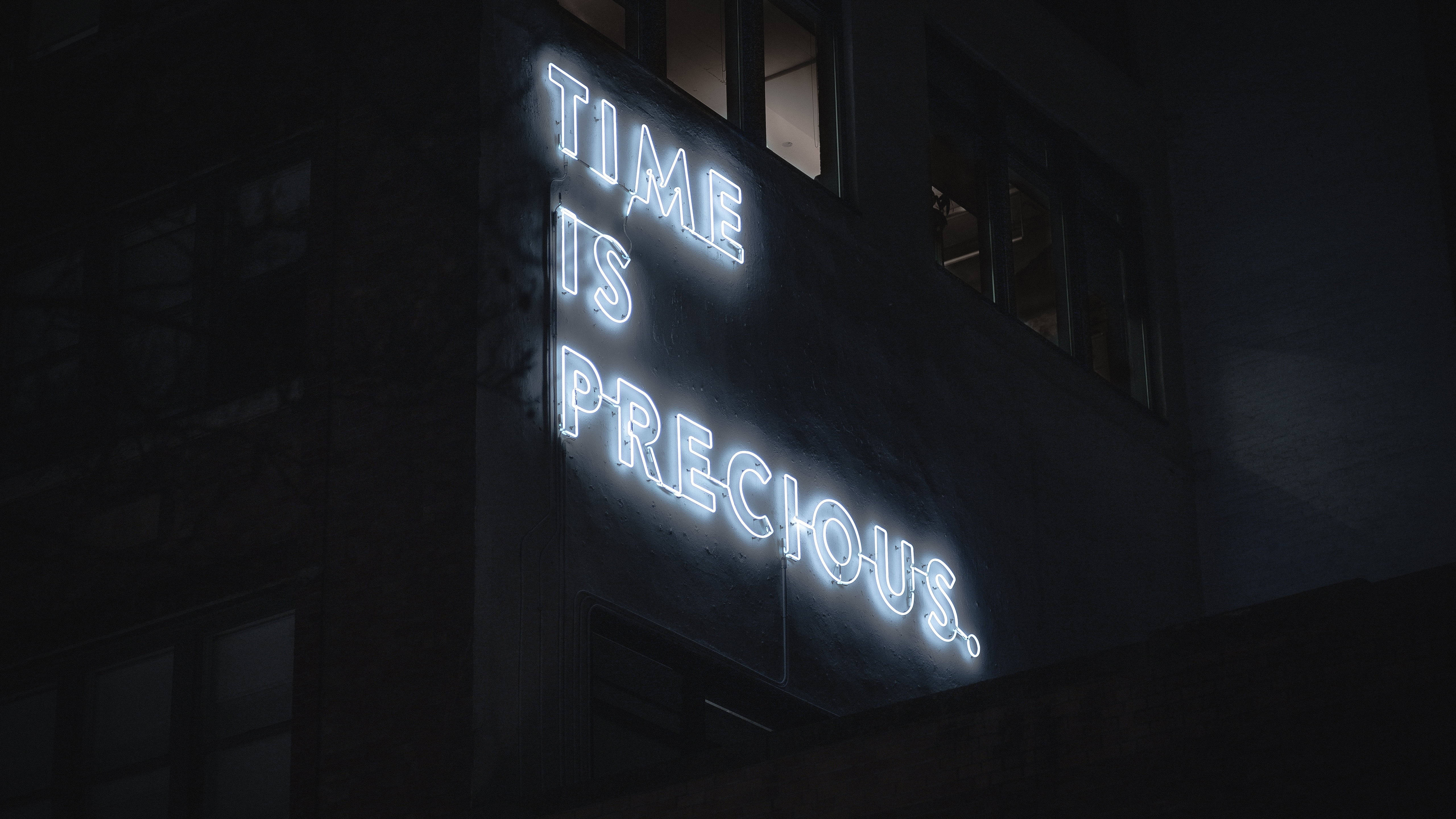 neon sign, time is precious, dark urban building facade, 5K Desktop Wallpaper