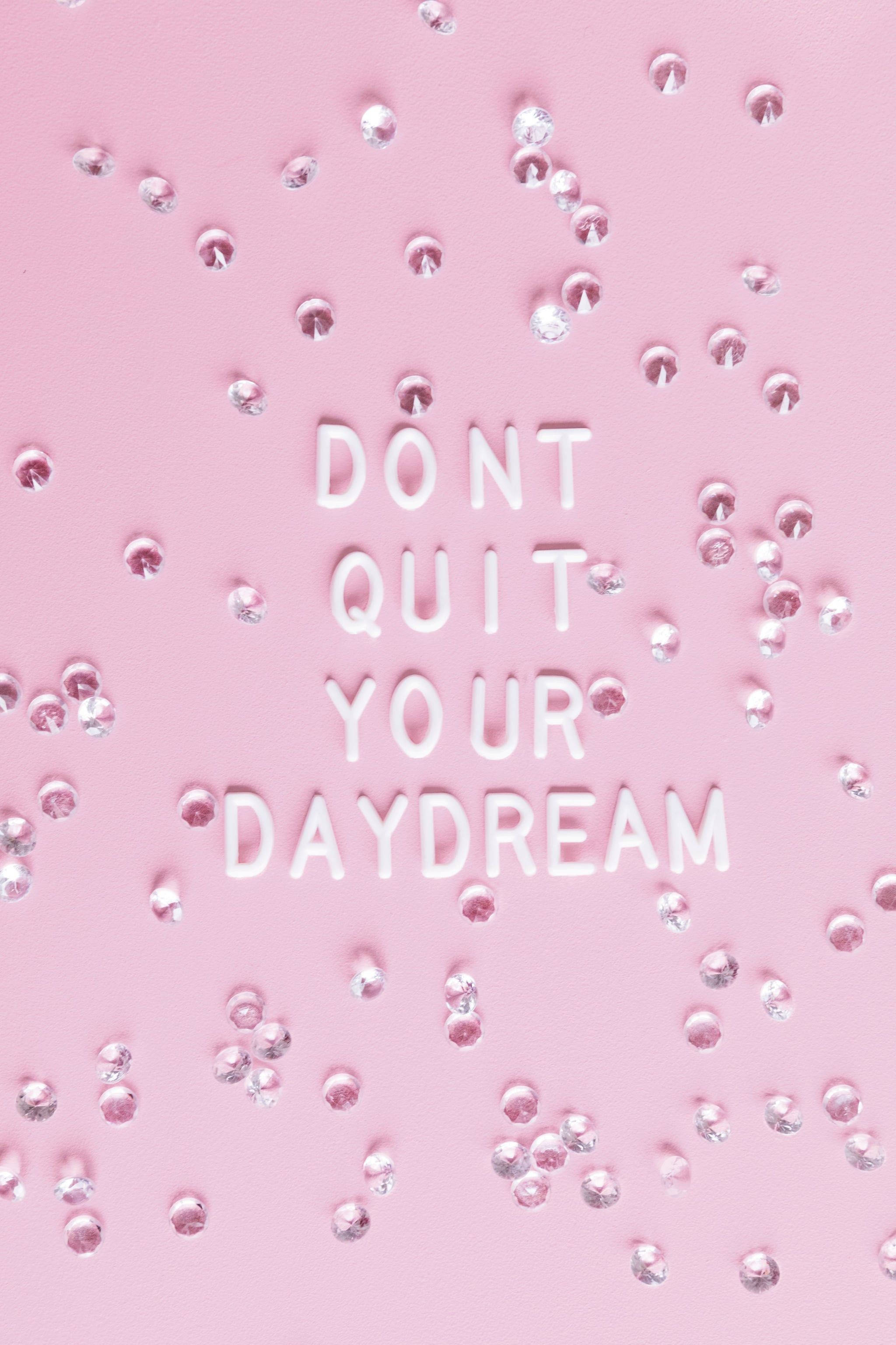 DON'T QUIT YOUR DAYDREAM, white 3d letters, soft pink surface, 2K Phone Wallpaper
