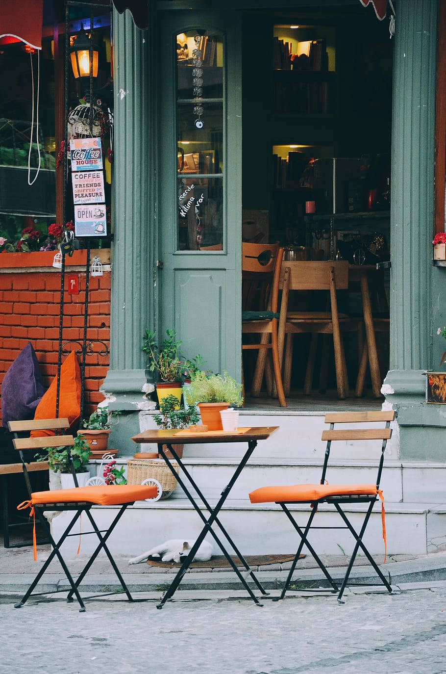 orange chairs, stone step, brick wall, HD Phone Wallpaper