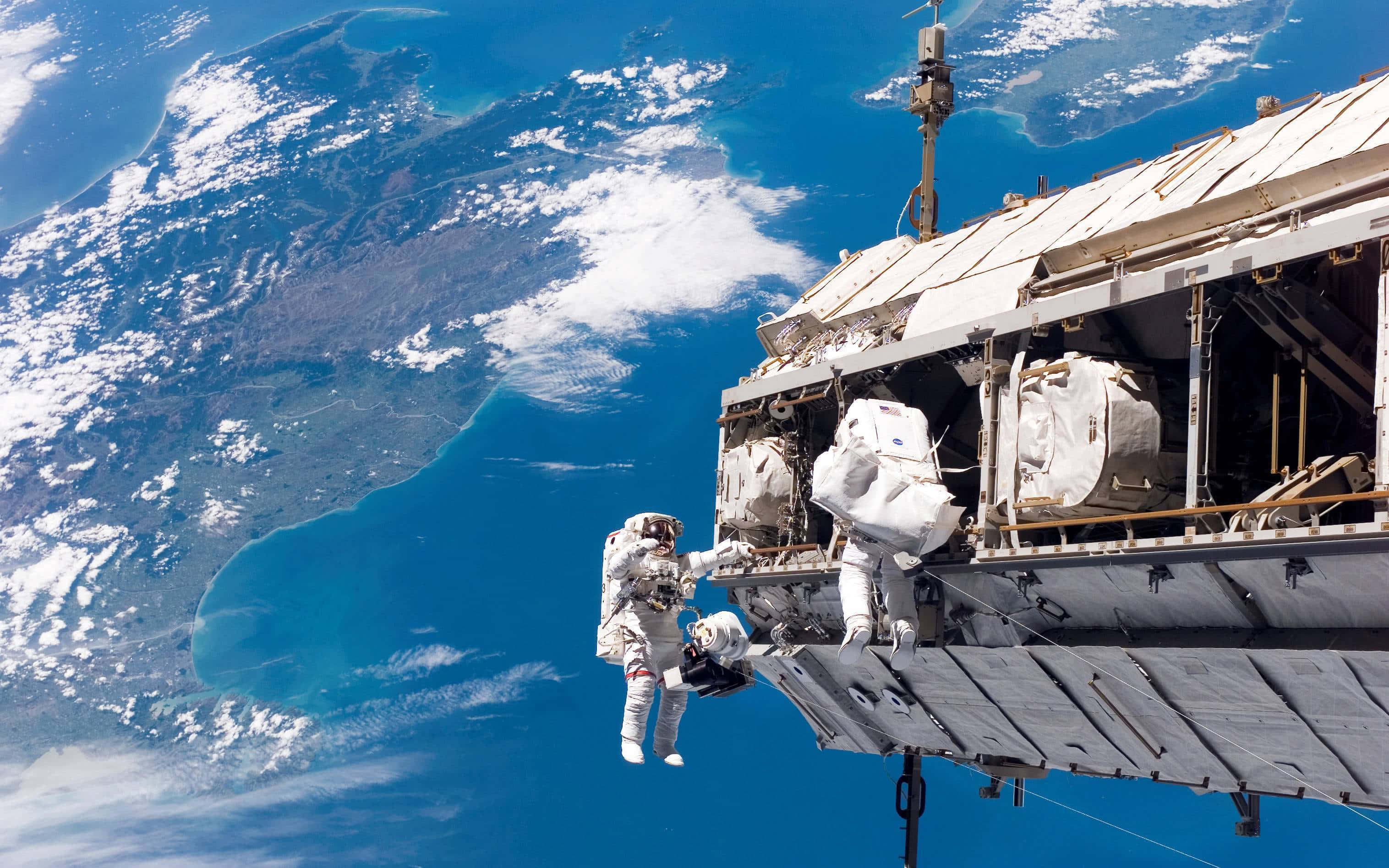 International Space Station, Earth, blue oceans, 2K Desktop Wallpaper
