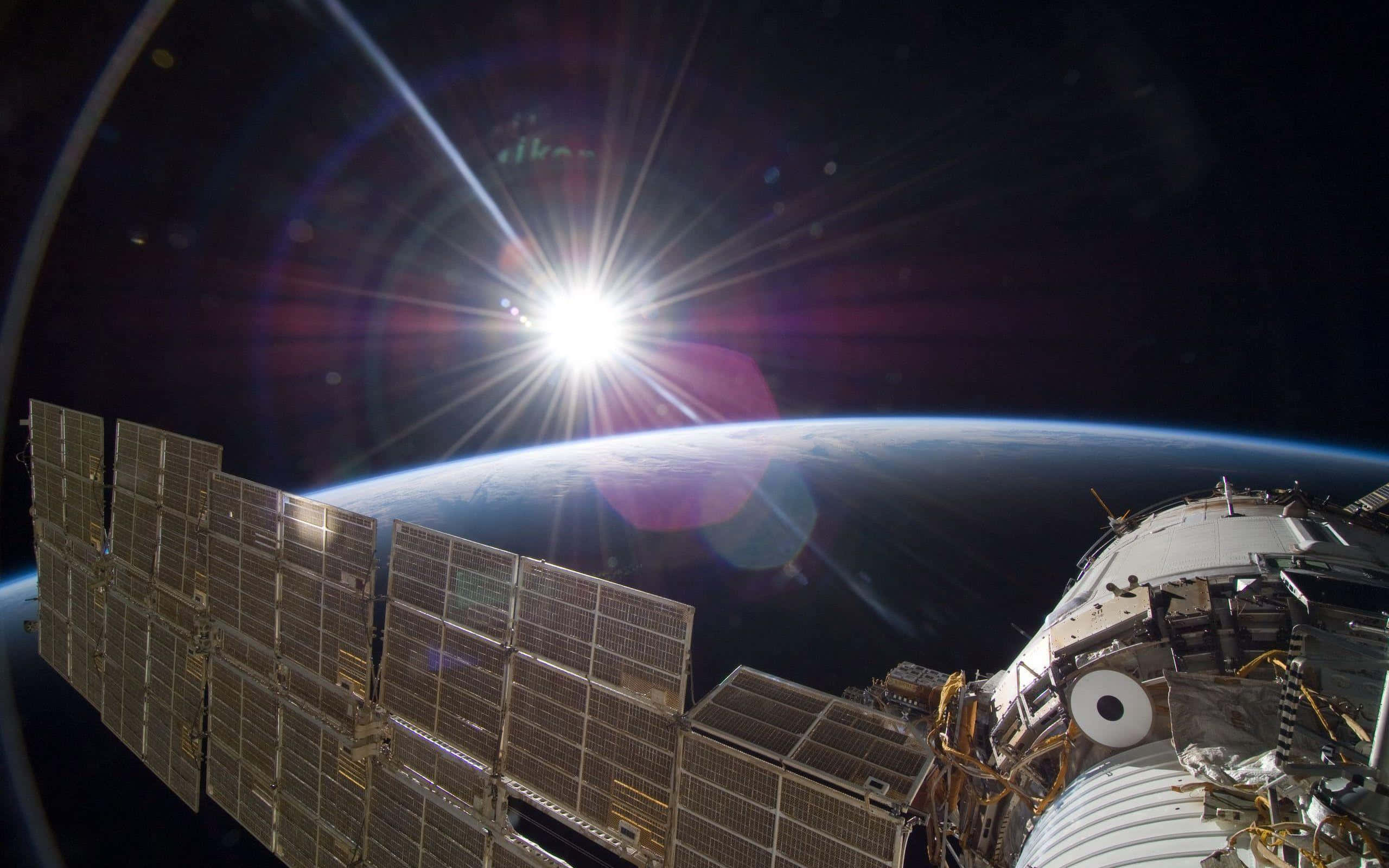 International Space Station, Earth, sun, 2K Desktop Wallpaper