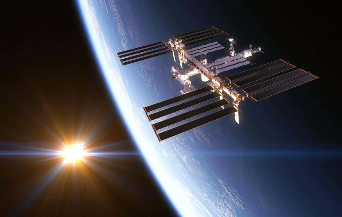 International Space Station, Earth, sunburst glare, SD Desktop Wallpaper