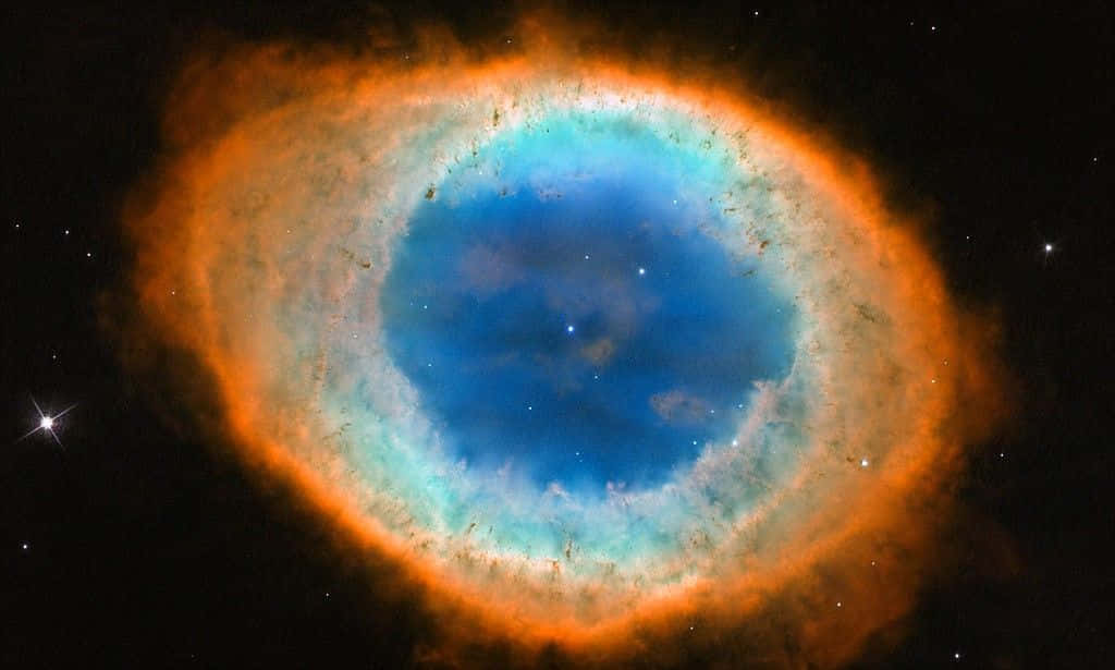 Interstellar Cloud, cosmic eye nebula, vibrant blue center, SD Desktop Wallpaper
