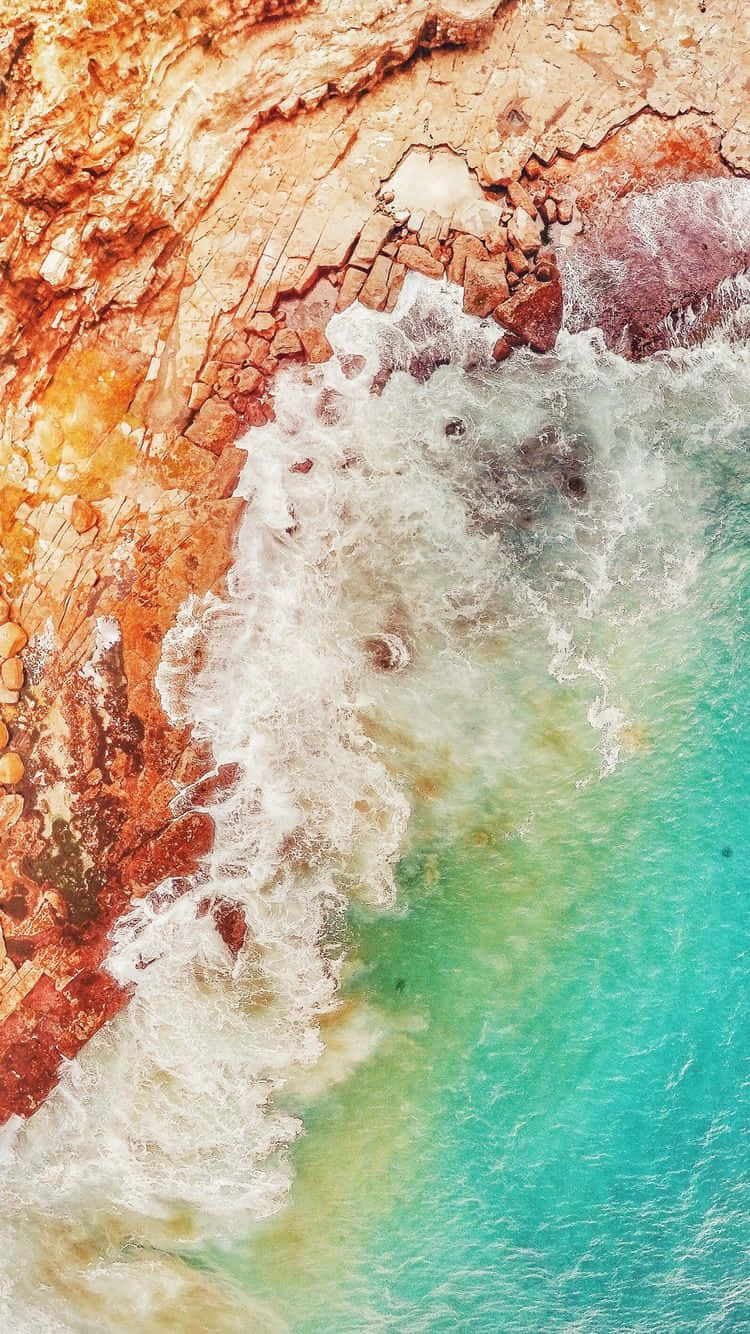 iOS 1, turquoise waves, rugged orange cliffs, HD Phone Wallpaper