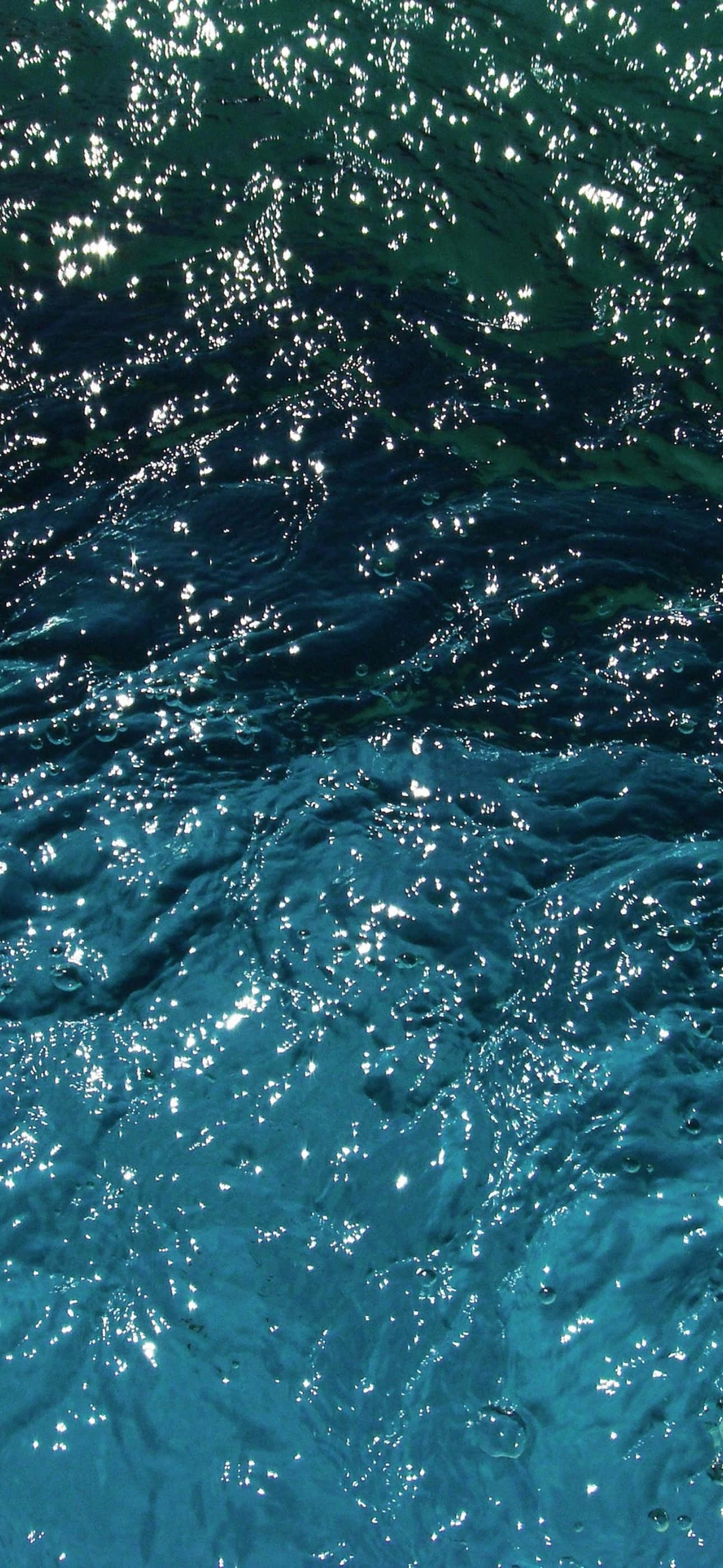 iPhone 15 Pro Max, turquoise ocean waves, sparkling highlights, 2K Phone Wallpaper