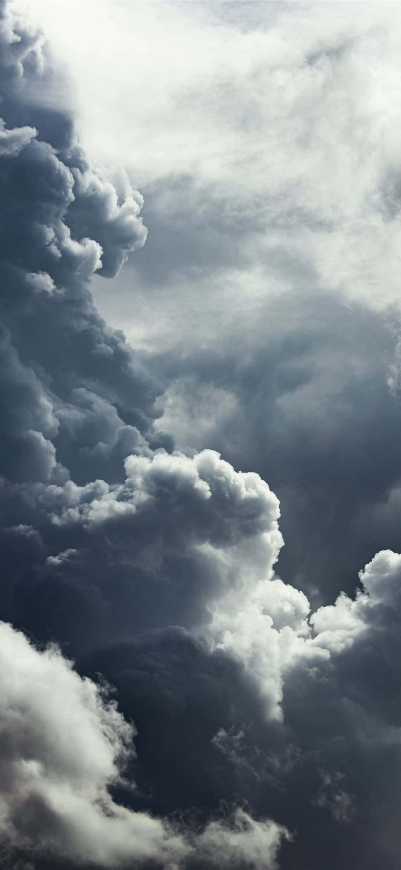 iPhone 15 Pro Max, storm clouds, deep grays, 2K Phone Wallpaper