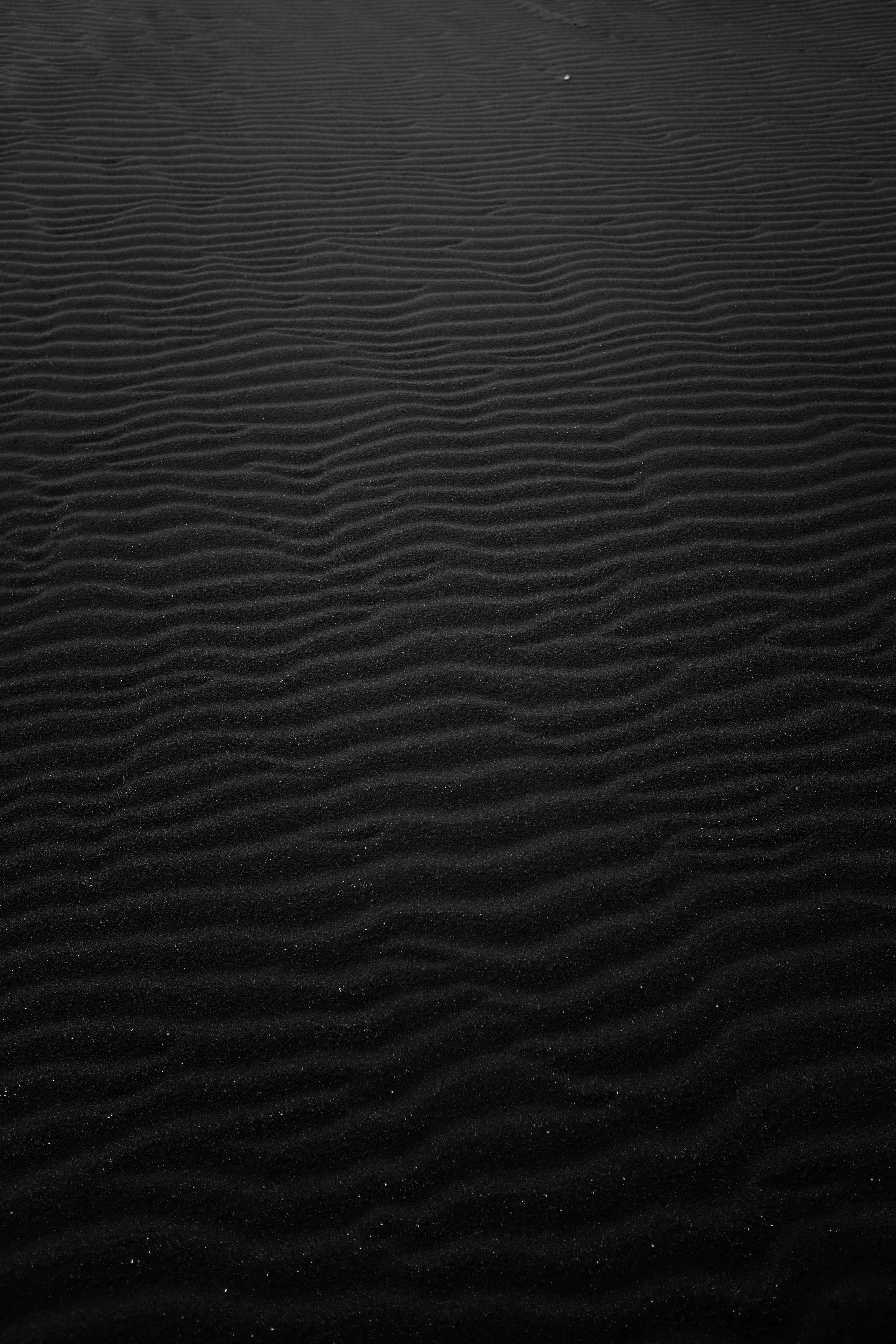 iOS 4, dark rippled sand, subtle texture, 5K Phone Wallpaper
