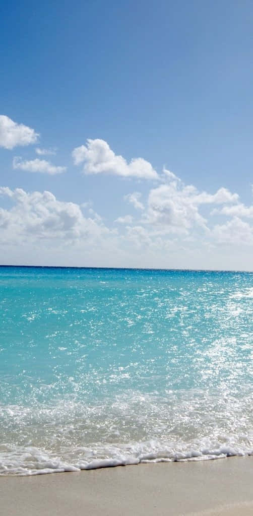 iOS Beach, Turquoise ocean, sandy shore, SD Phone Wallpaper