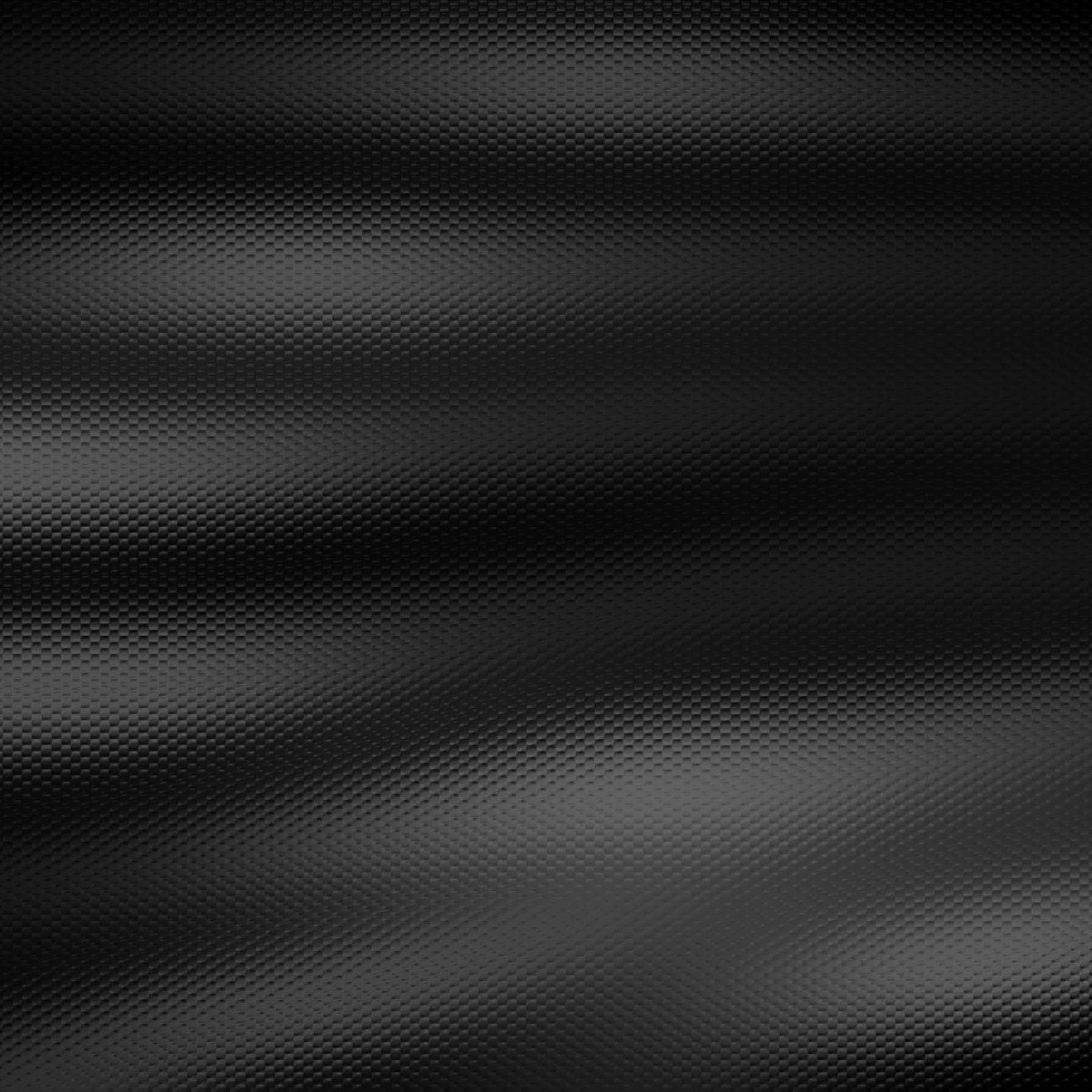 dark iPad, sleek black carbon fiber surface, subtle wavy texture, 2K Desktop Wallpaper