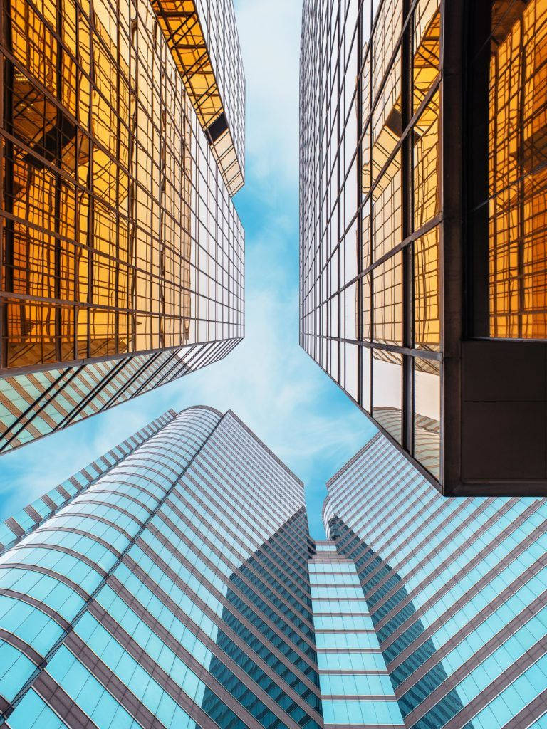 iPad Pro, glass skyscrapers, bright blue sky, SD Phone Wallpaper