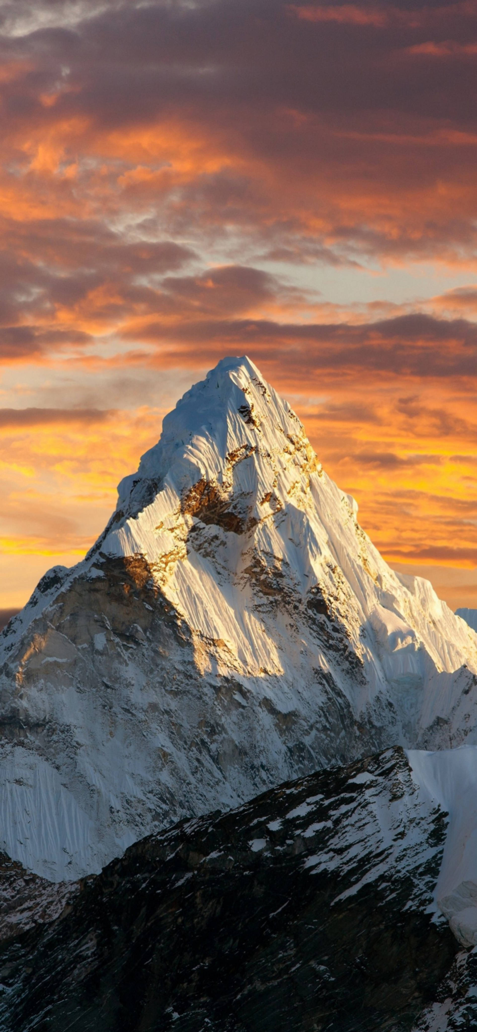 iPhone 13 Pro Max, snowcapped mountain peak, fiery orange and pink sunset sky, 4K Phone Wallpaper