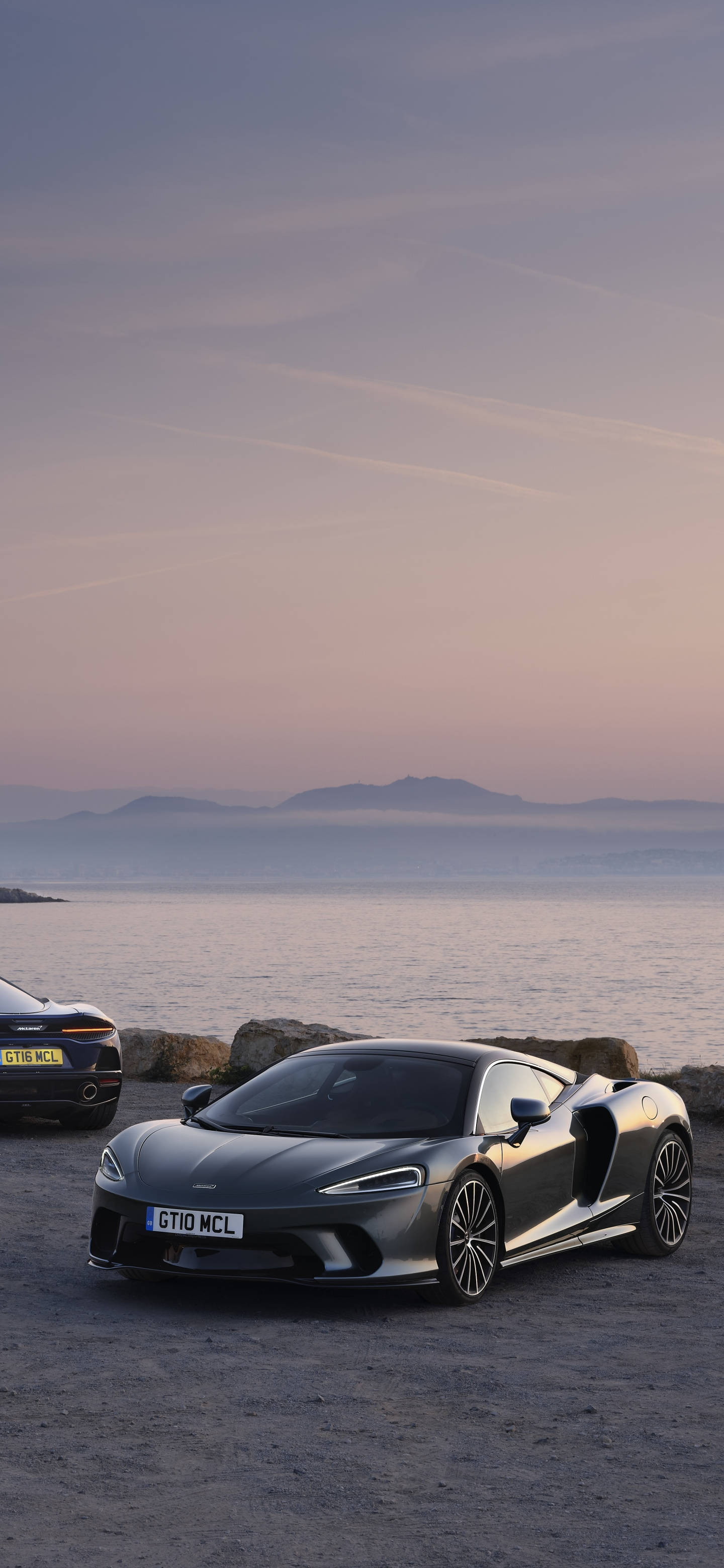 iPhone 13 Pro, black sports car, rocky beach, 2K Phone Wallpaper