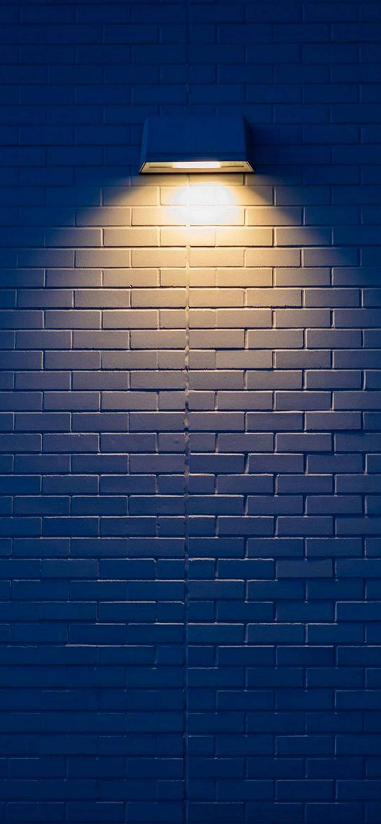 iPhone 14 Plus, dark blue brick wall, night, 2K Phone Wallpaper