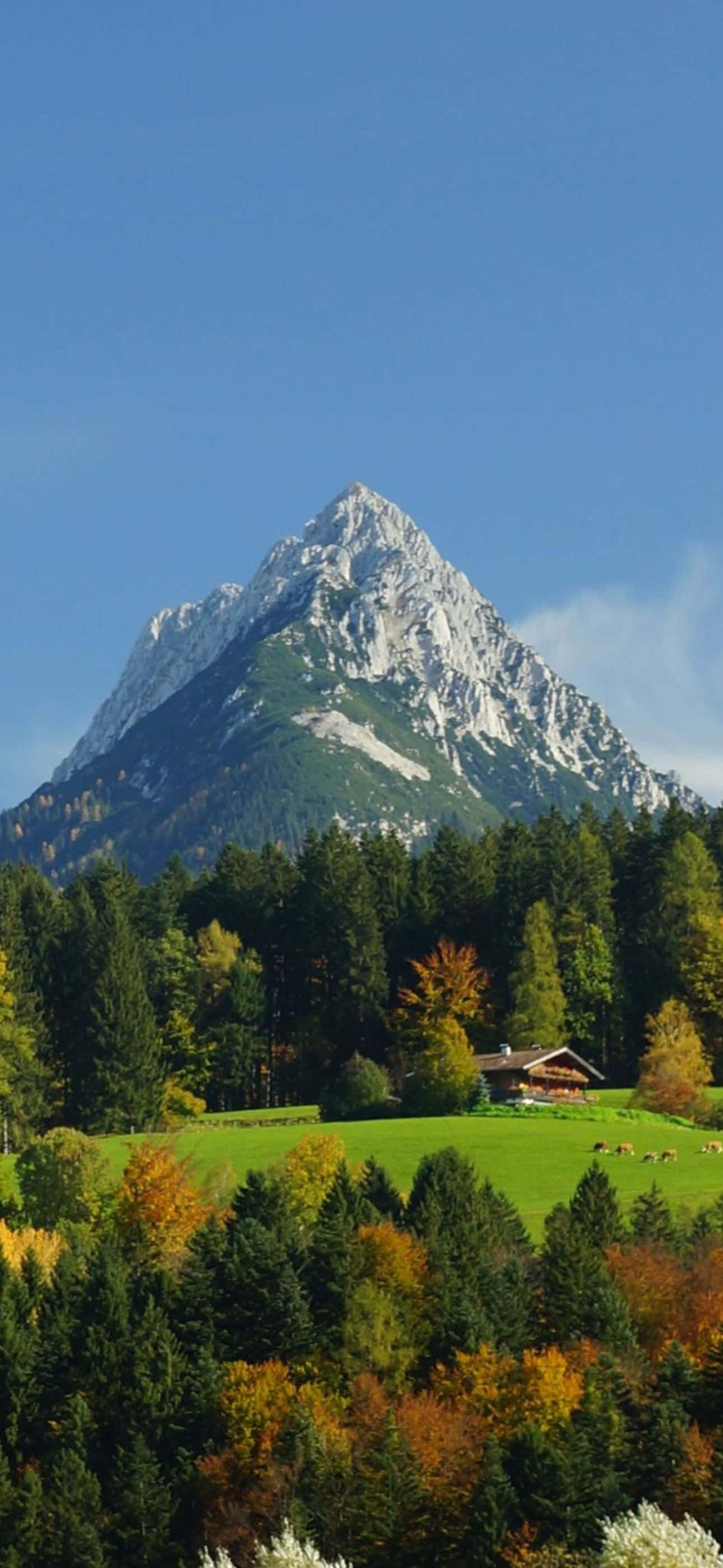 iPhone 14 Pro Max, 6.7-inch edge-to-edge OLED display, snow-capped mountain, 2K Phone Wallpaper