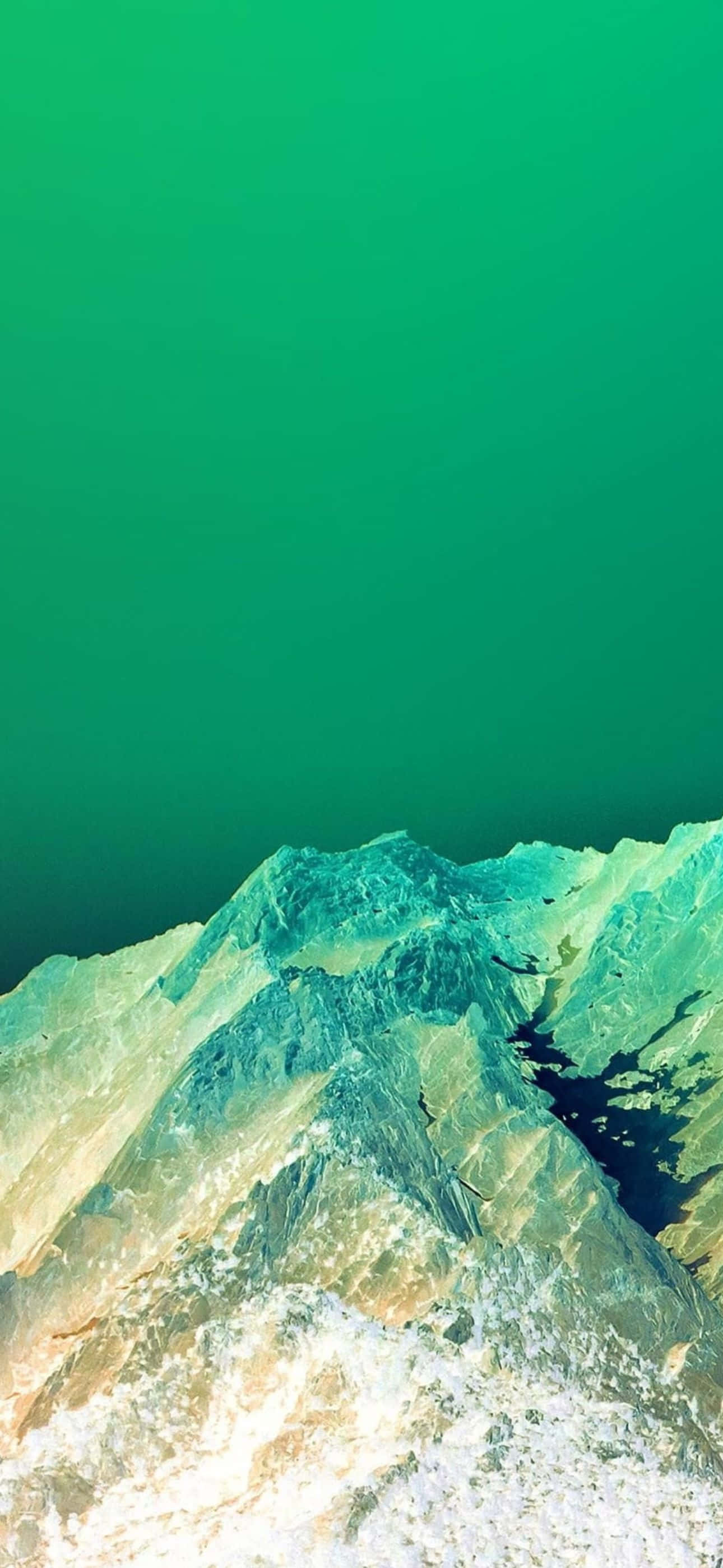 iPhone 14 Pro Max, jagged mountain peaks, vast teal ocean, 2K Phone Wallpaper