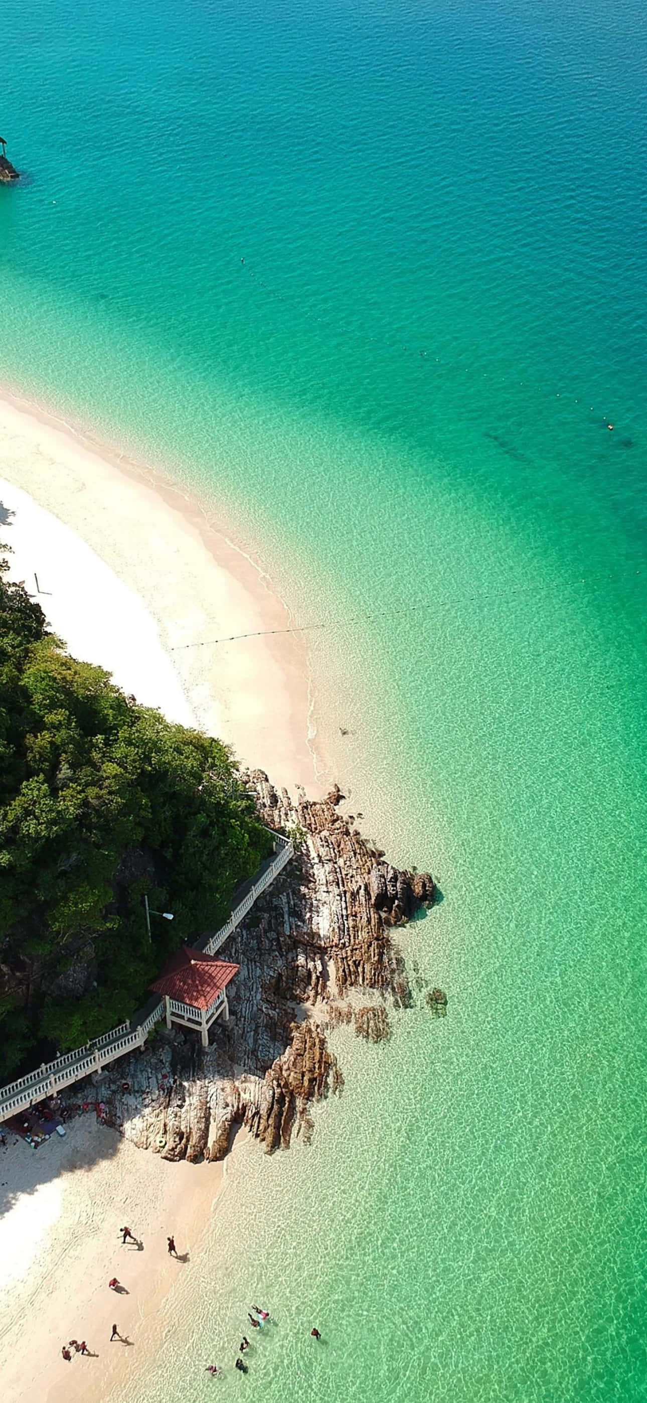 iPhone 15 Pro Max, white sand beach, turquoise water, 2K Phone Wallpaper