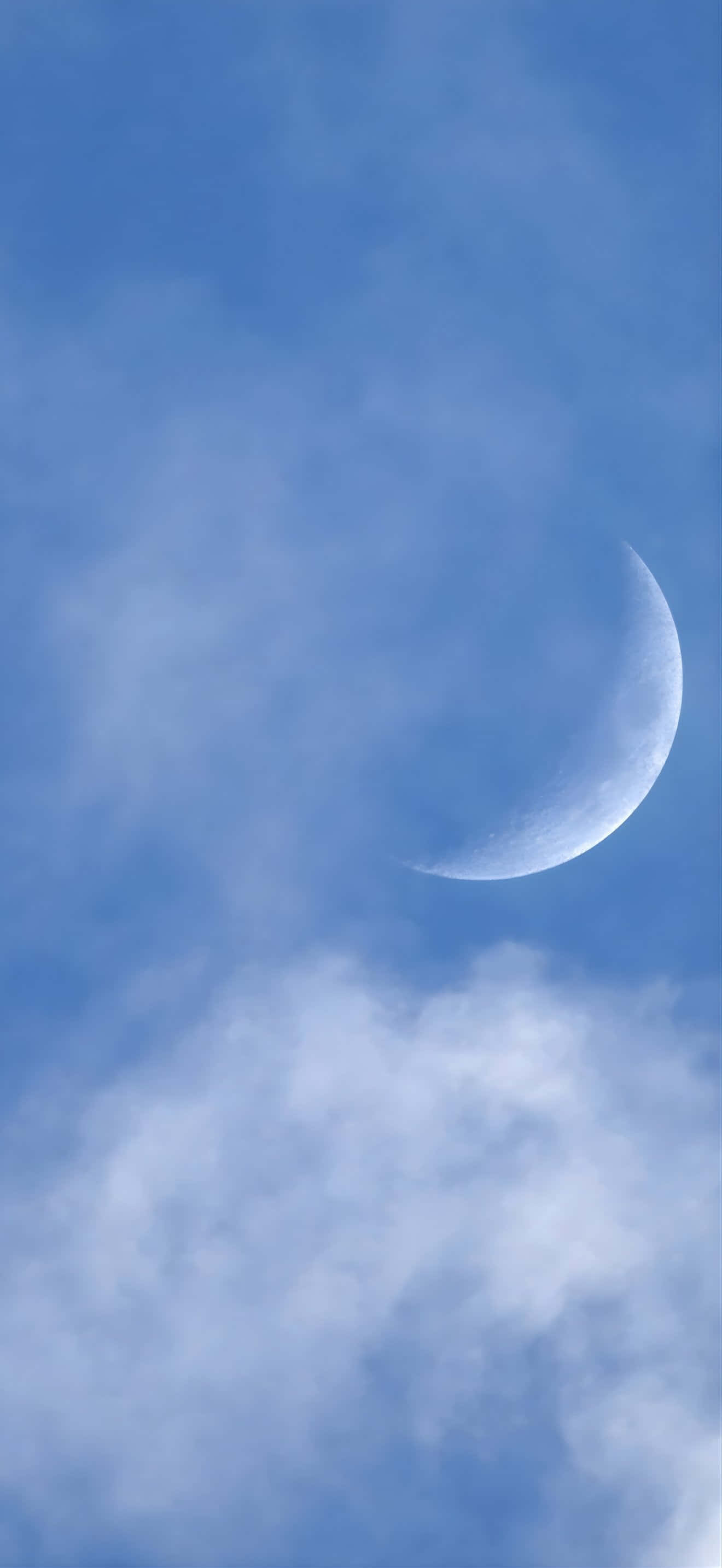 iPhone 17 Pro Max, crescent moon, serene blue sky, 2K Phone Wallpaper