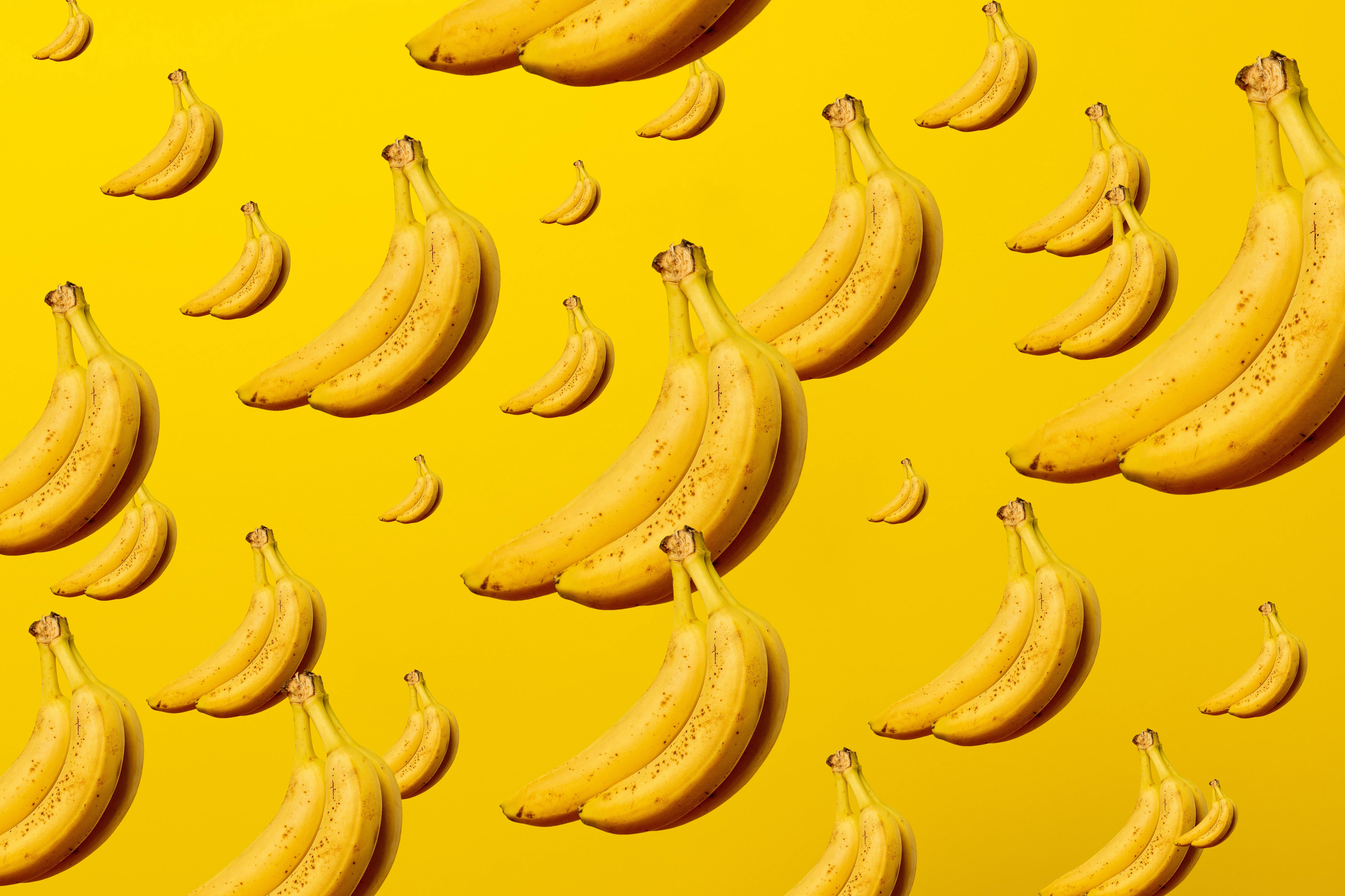 iPhone 4K, yellow bananas, bold yellow background, 5K Desktop Wallpaper