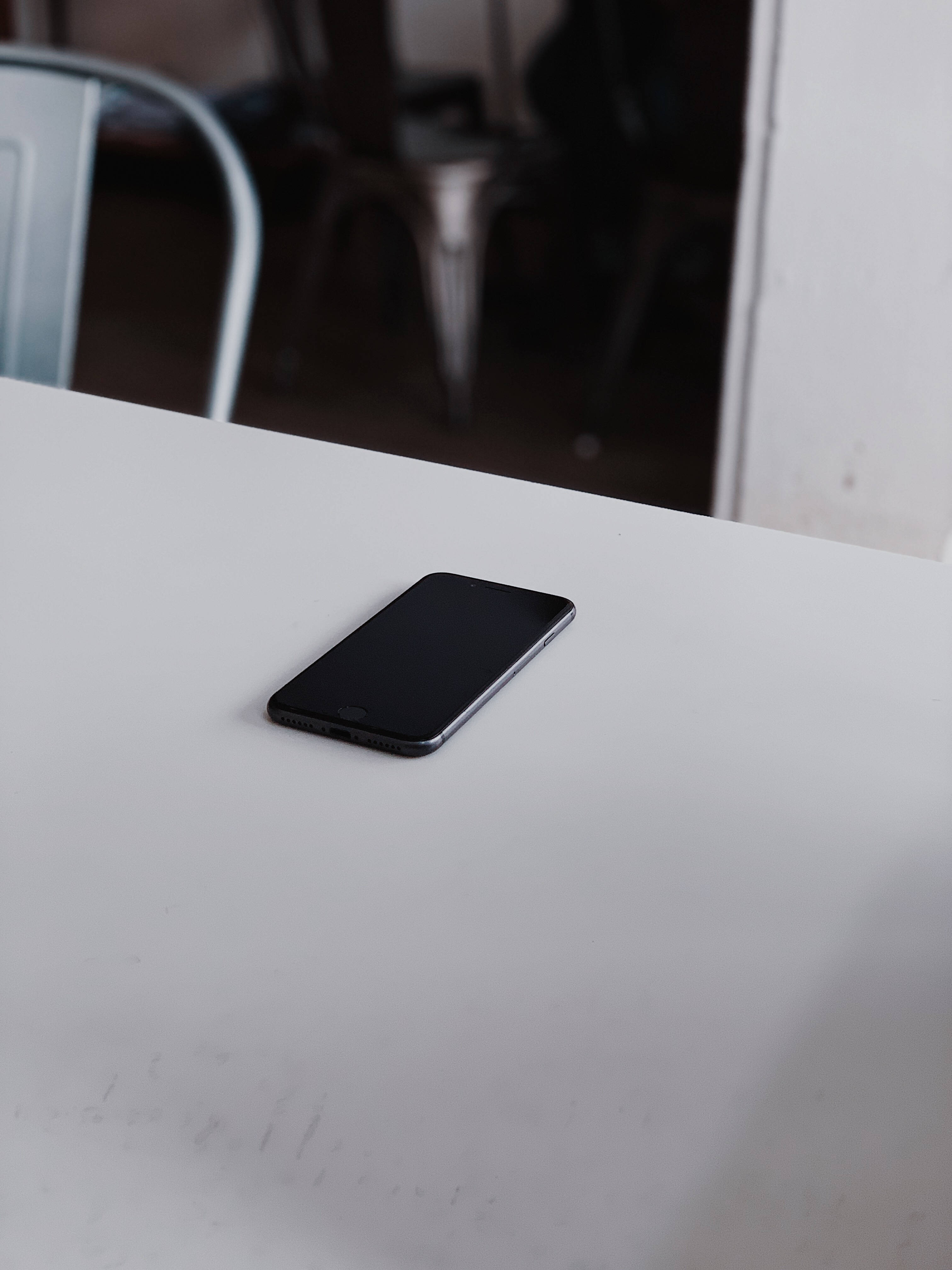 iPhone 8, black, minimalist white table, 4K Phone Wallpaper